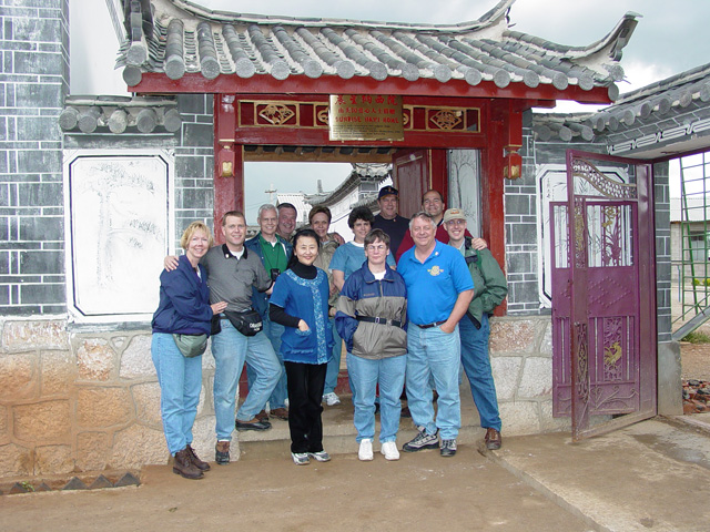 Group in front of Naxi home at LiJiang Orphanage