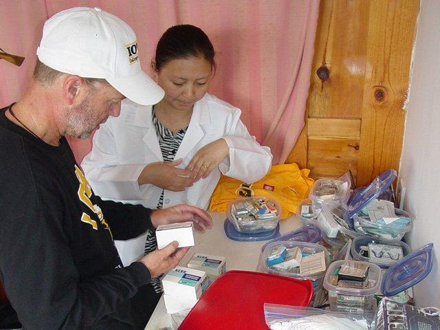 Scott delivering dental equipment to Ren Li Clinic