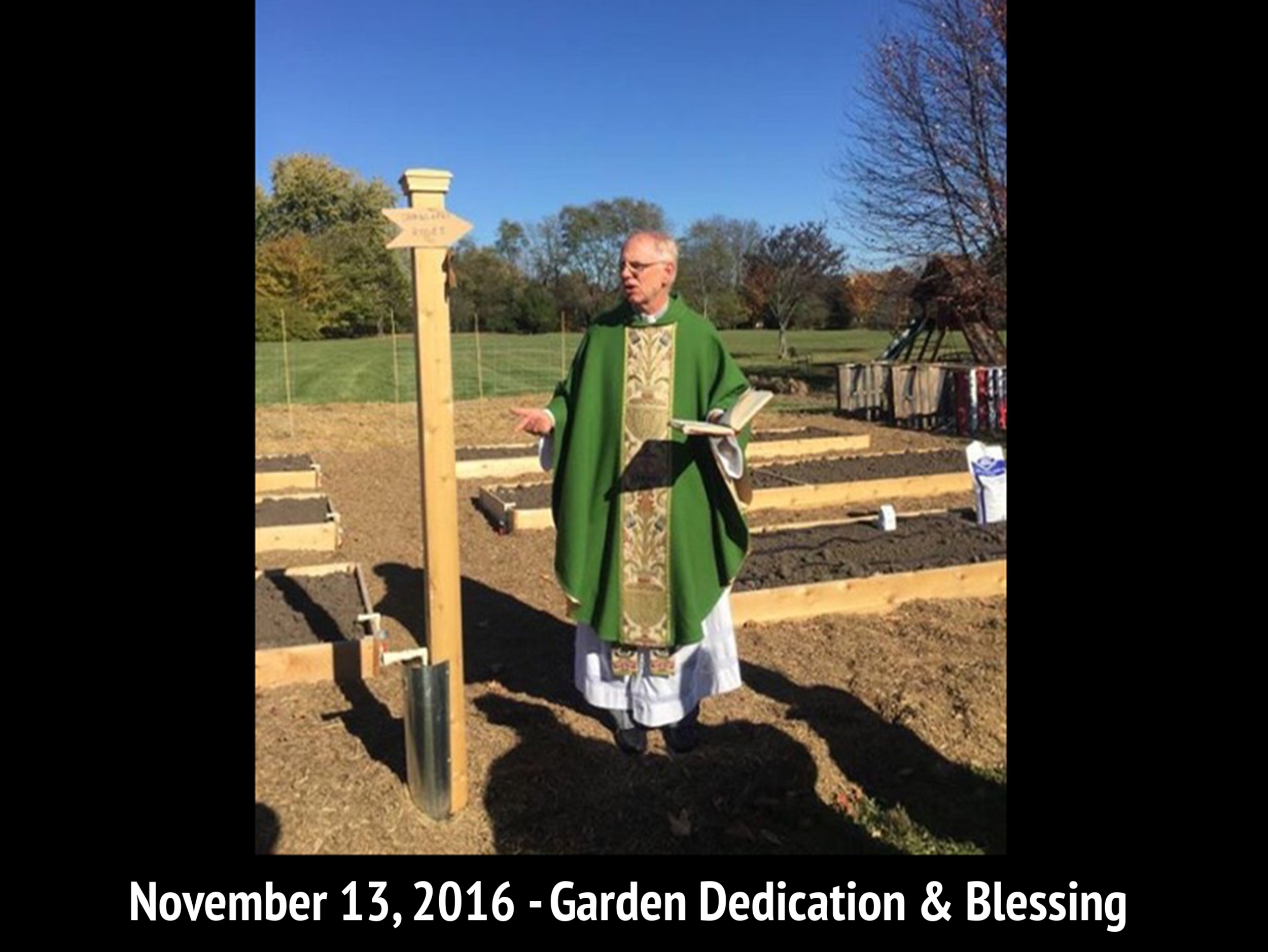 Fr. Lee Schaefer Blessing St. Michael's Community Garden.jpg