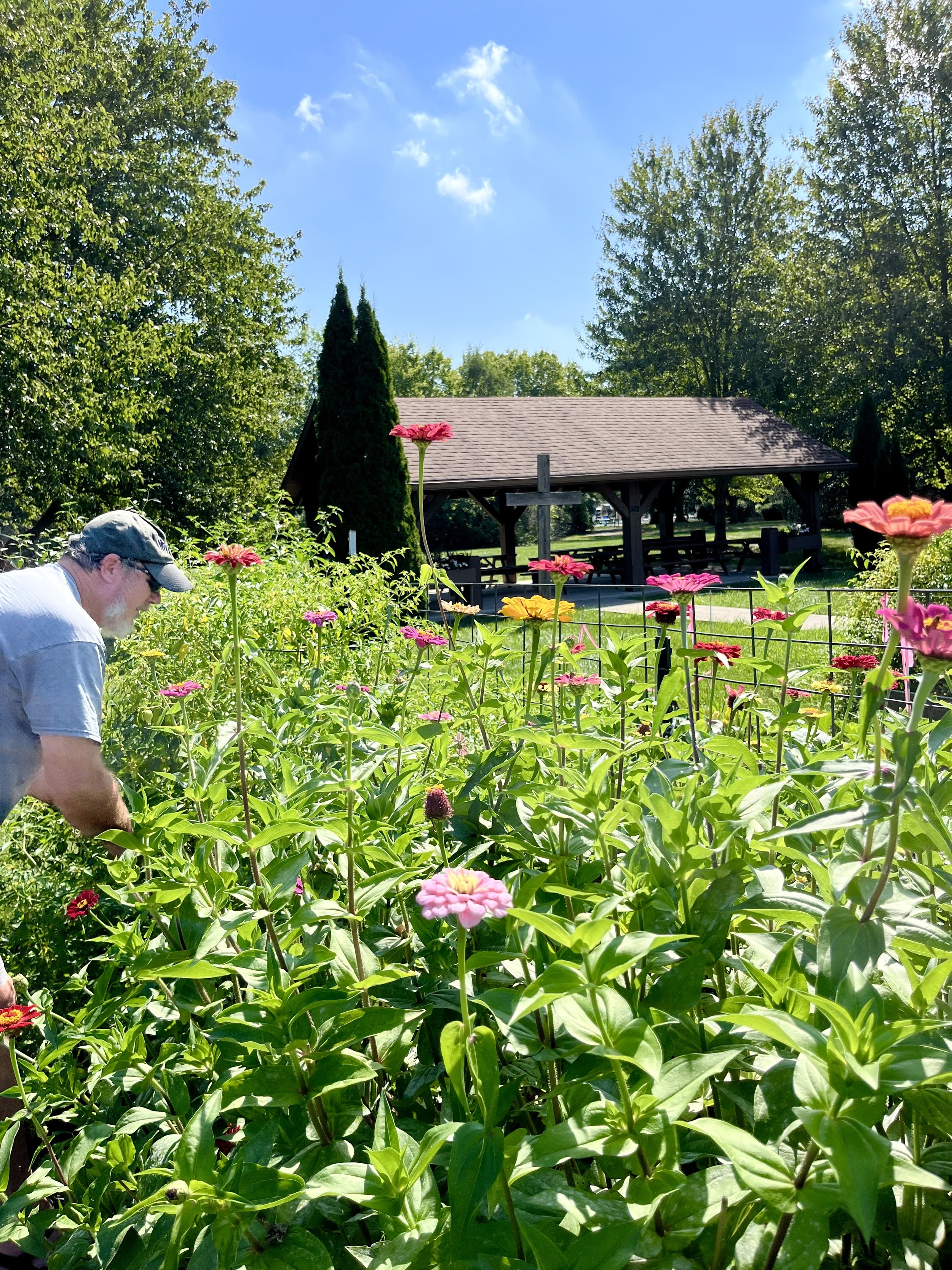 Al Geisler in the Garden with Cross.jpg