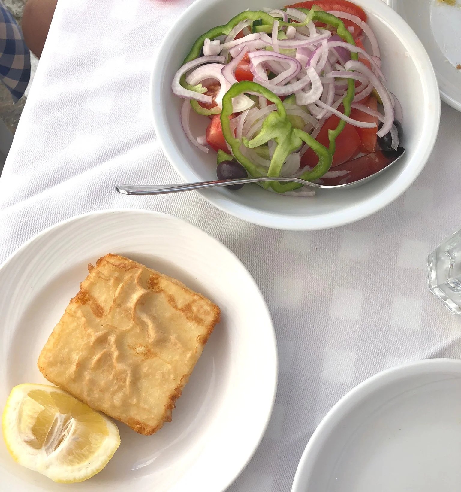 The salads are so good! Fresh peppers, onions, tomatoes, and whatever else they offer. Fried cheese called saganaki is mouthwatering..