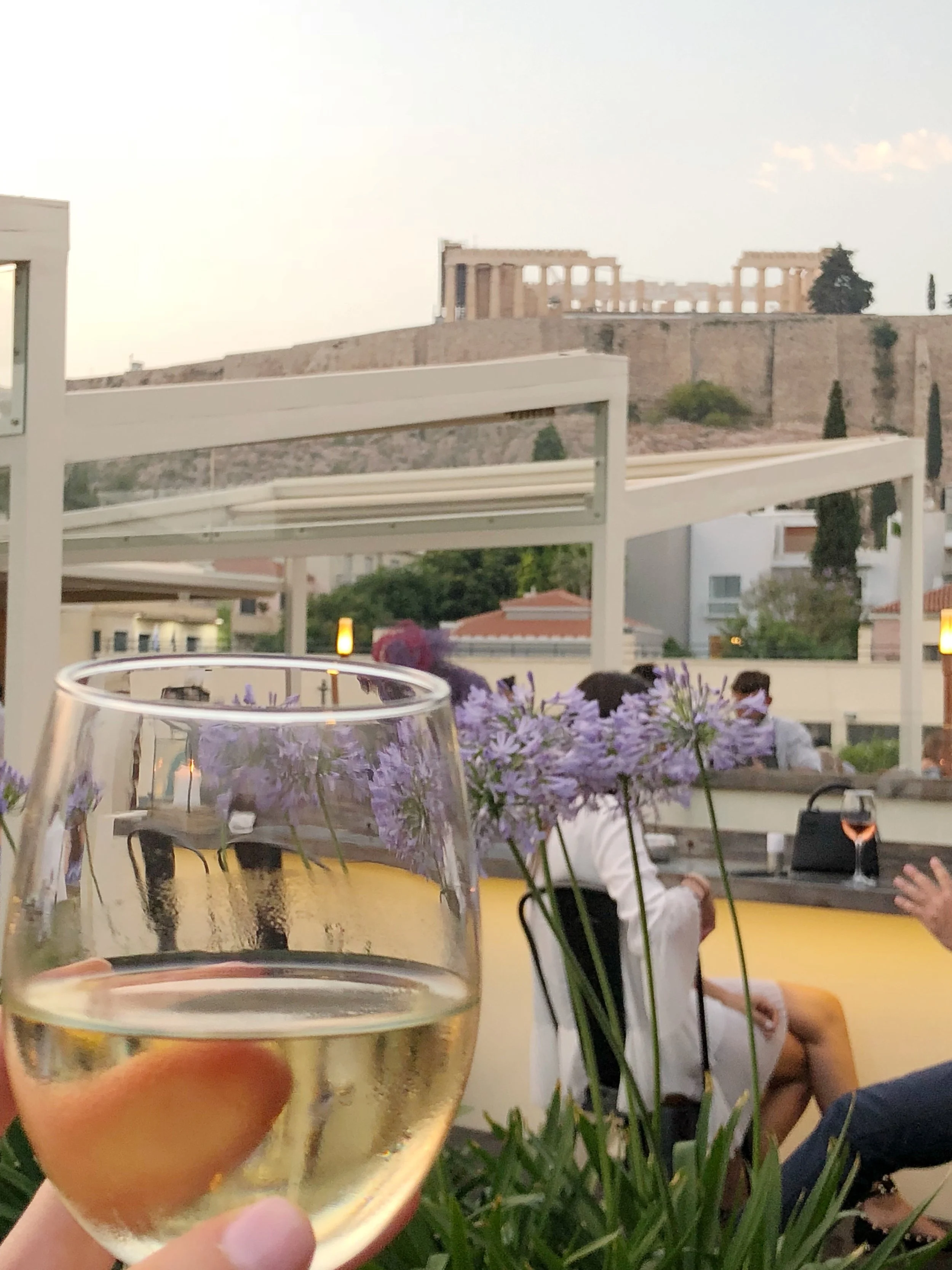 We arrived in Athens just in time to catch the sunset over the Acropolis and have a glass of wine on the rooftop of the Herodion Hotel.