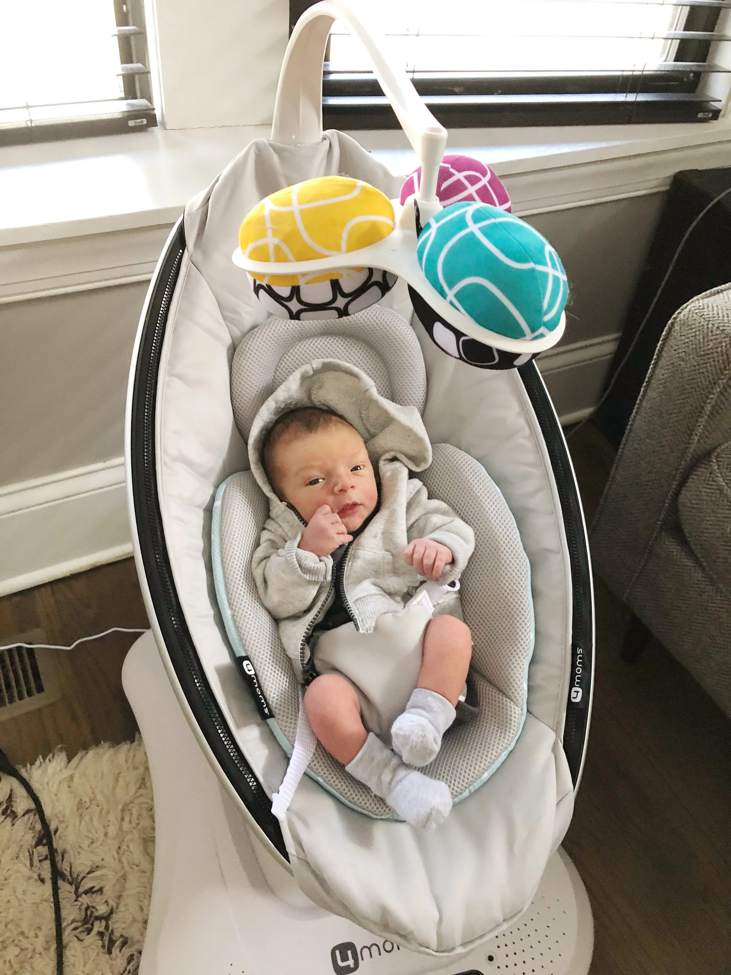 Using the MamaRoo at about 1 week old!