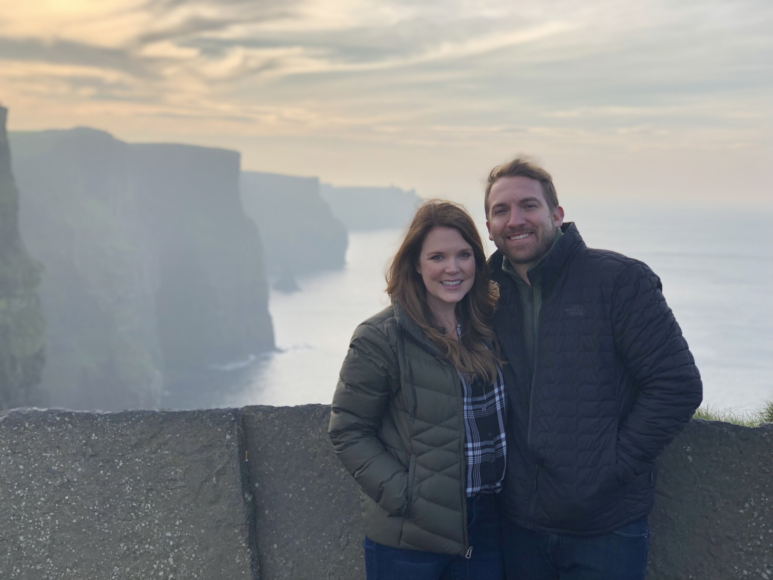 Me and my husband (and my baby bump!) at the Cliffs of Moher.