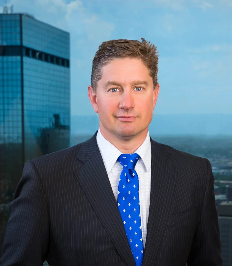 Professional business portrait of a CEO in a downtown high rise office building overlooking the cityscape photographed by Mark Quentin / StudioQphoto.com All images & text © 1995-2016 by Mark Quentin / StudioQphoto.com