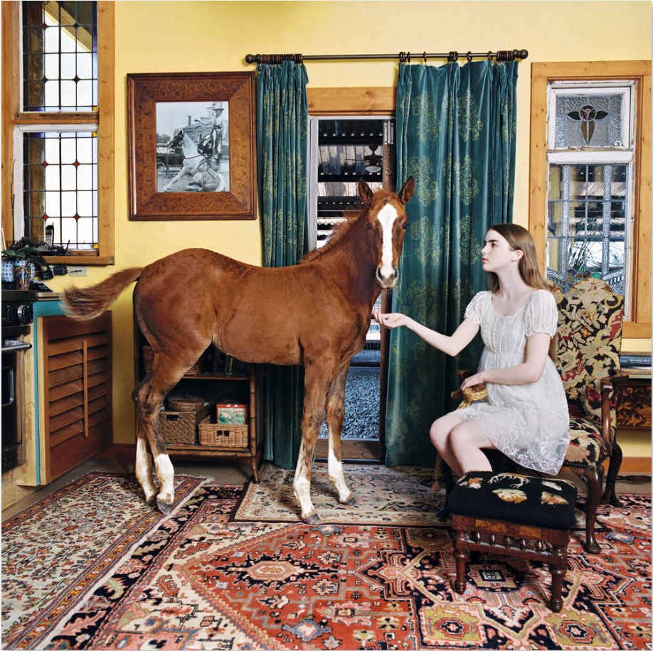 Young Girl with Colt in Living Room, Weatherford, Texas, 2006
