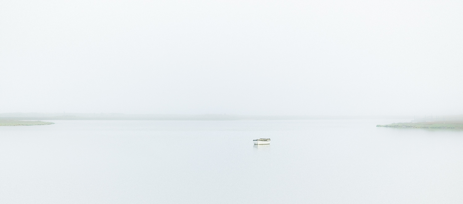 Rowboat in the Fog