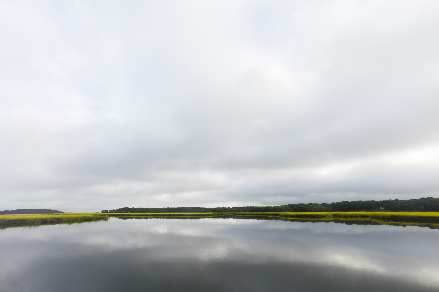  quiet calm clouds and water in the wetlands 