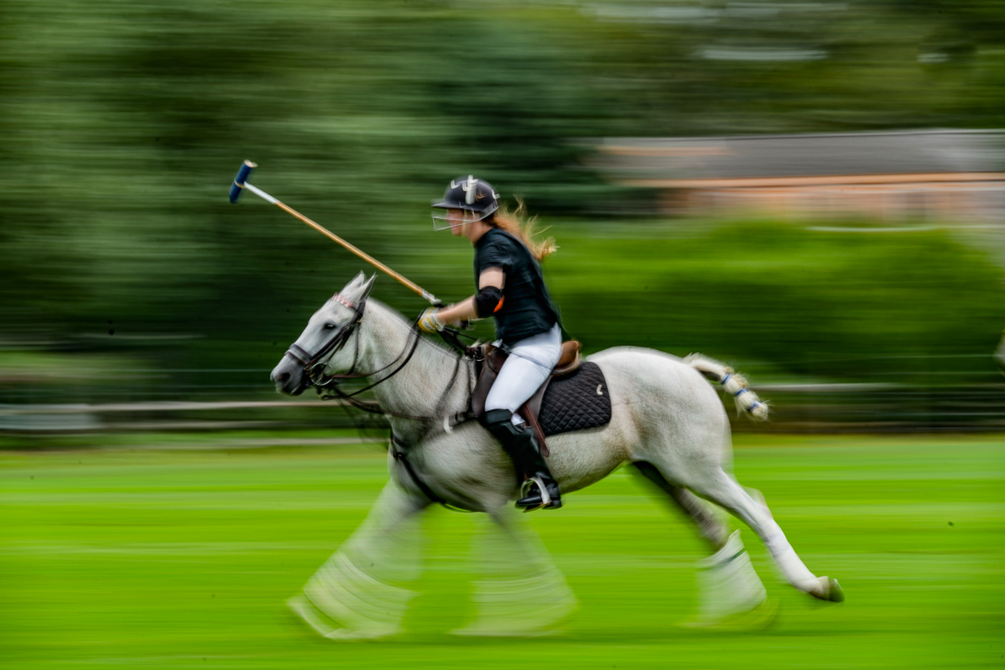 one of the women polo players  at the Southampton Polo Club in flight.jpg