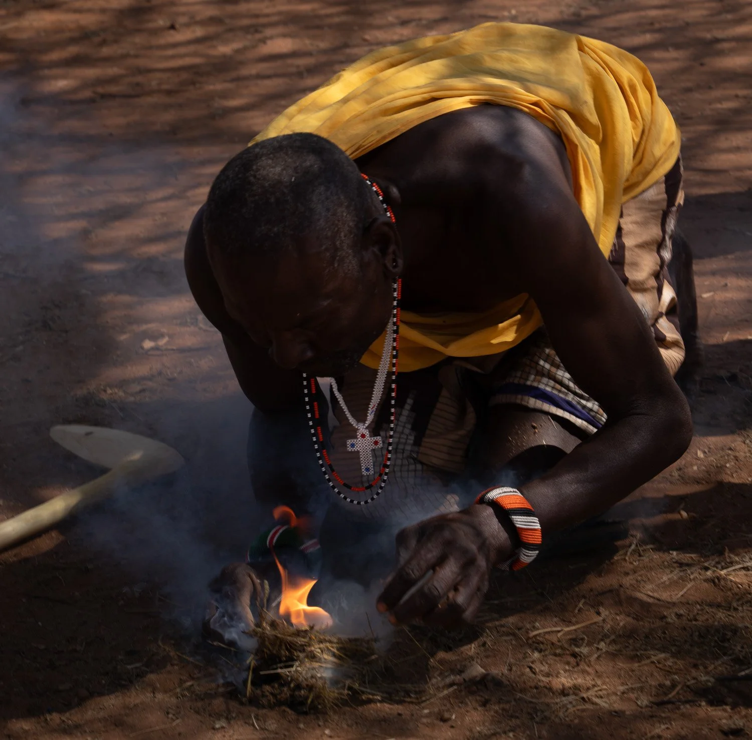 Masai starting fire