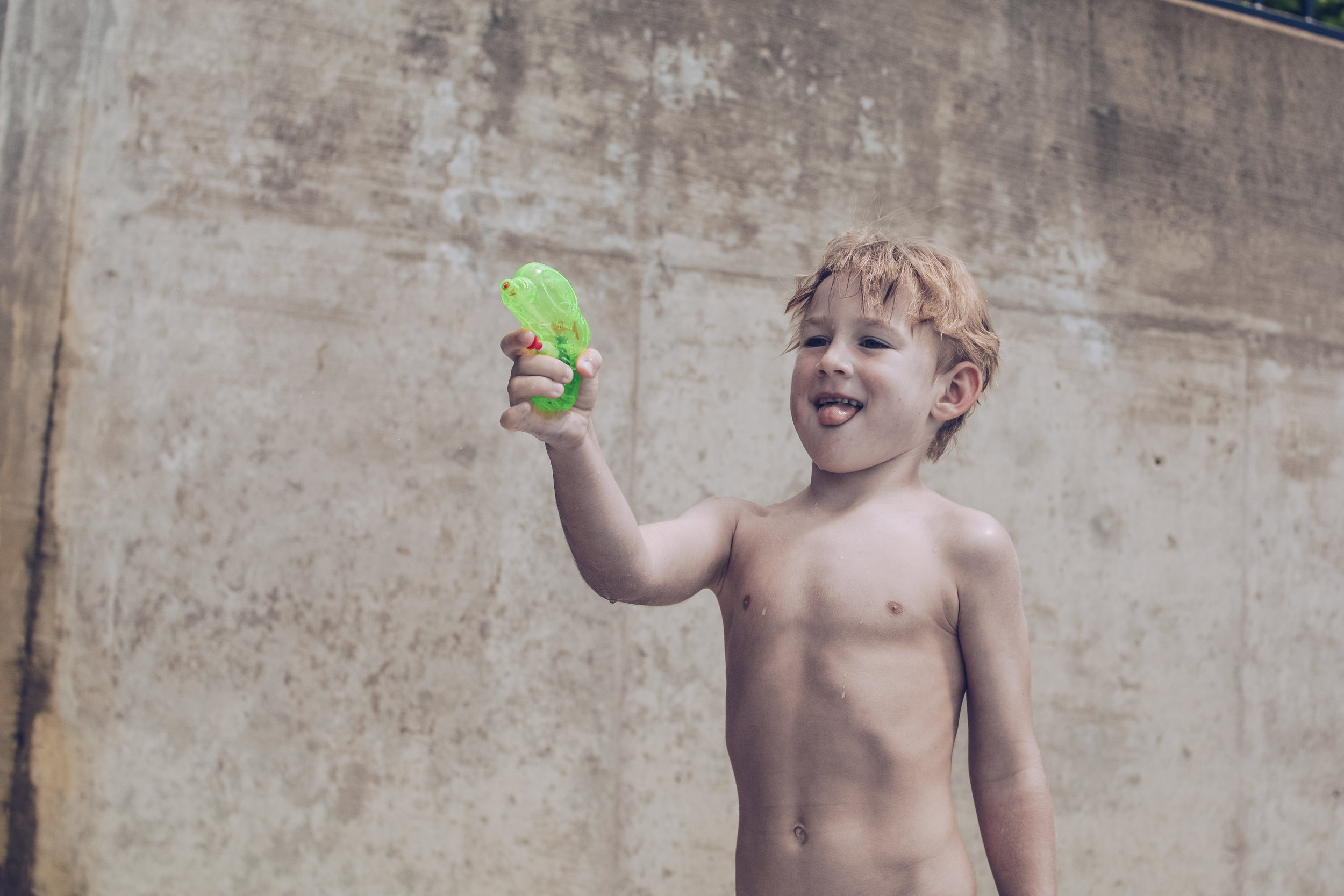 Super focused on his squirt gunning