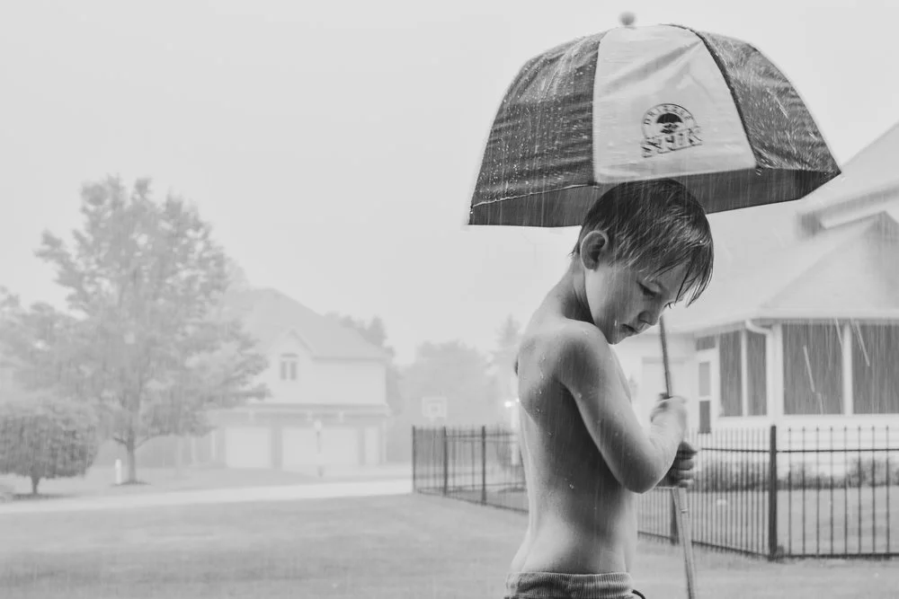 Henry playing in the rain in Carmel, Indiana