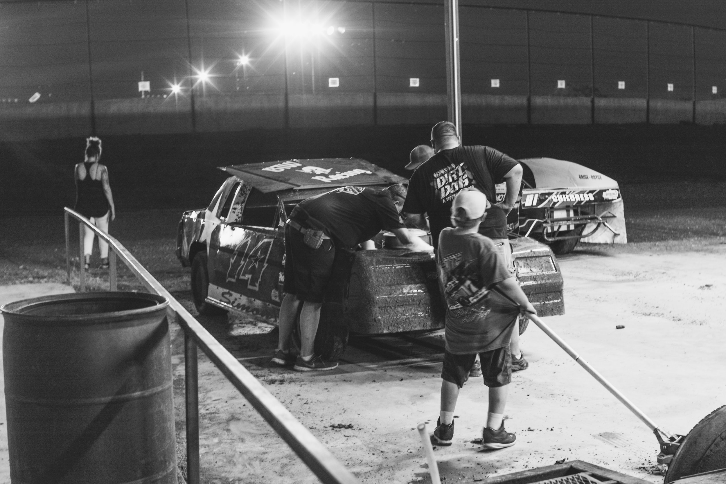 A son helping his elders prep the car