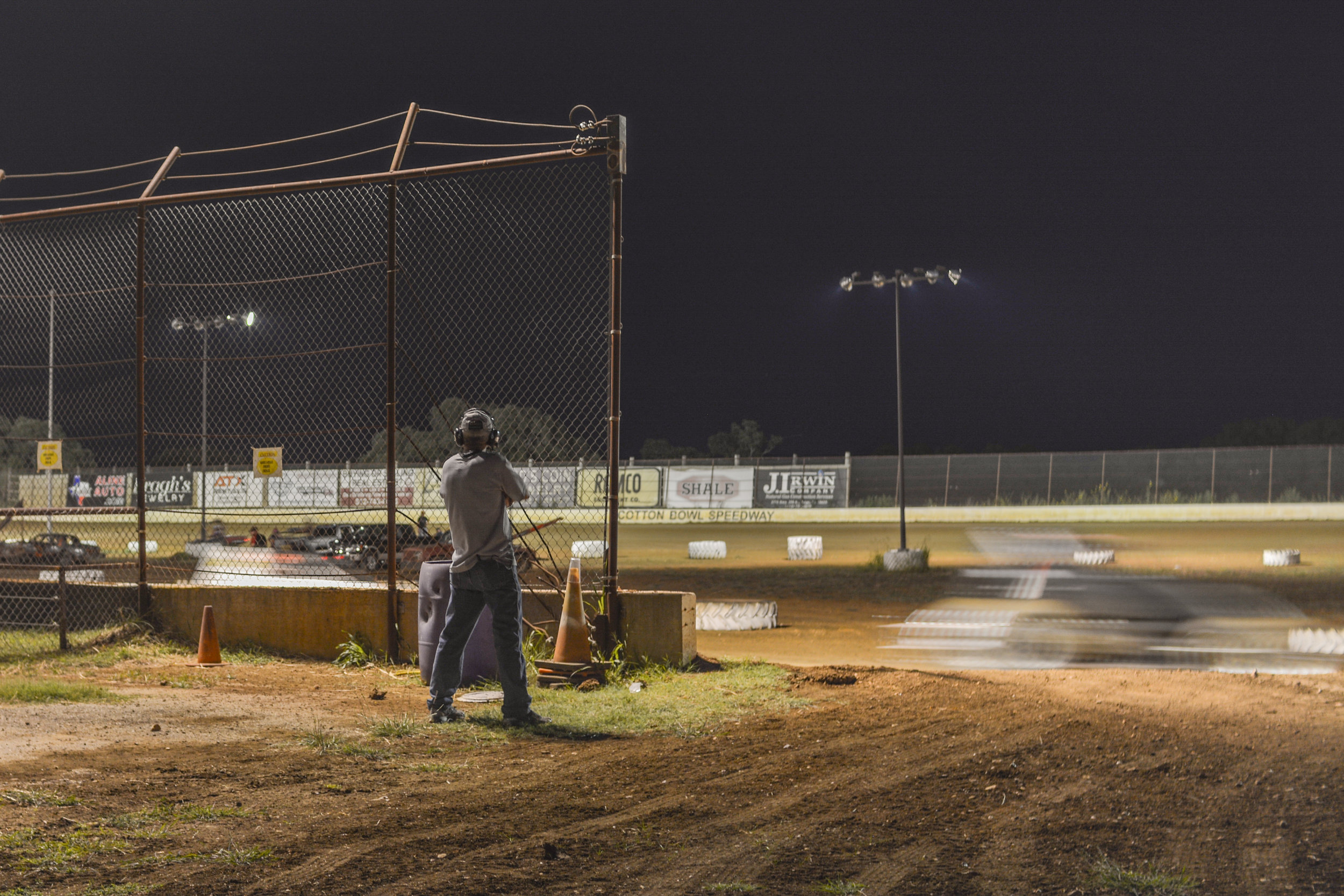 Pit manager (I'm sure that's not his real title) managing how cars exit the track