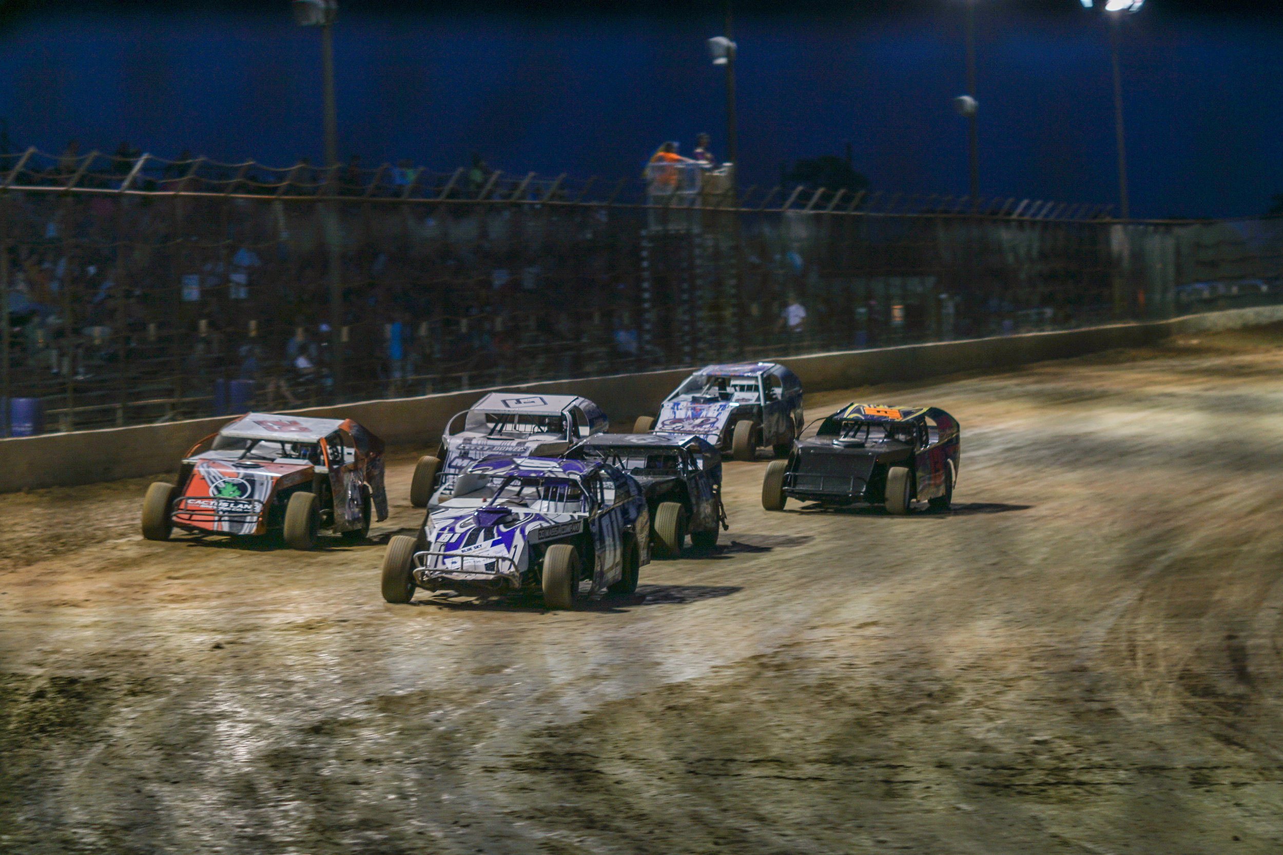 Cars as seen from the front heading down the straight-away