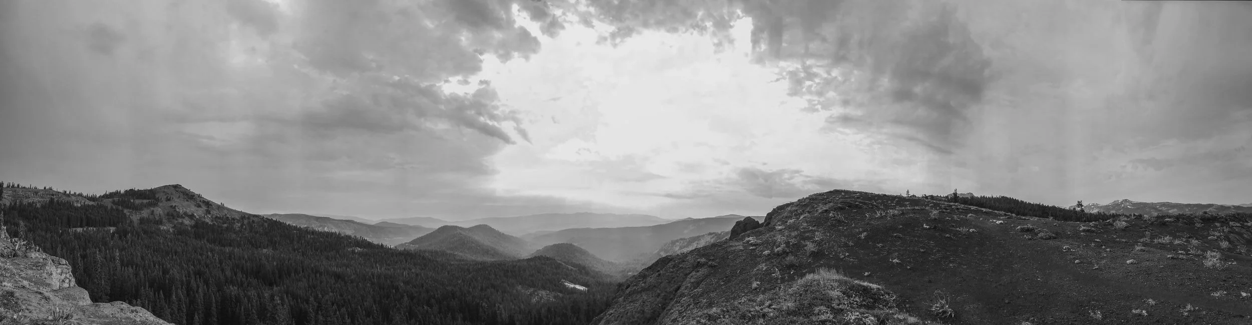 Those vertical streaks in the distance are spots of rain falling. This shot was taken in-between burst of rain (thankfully no thunder) on top of the ridge. 