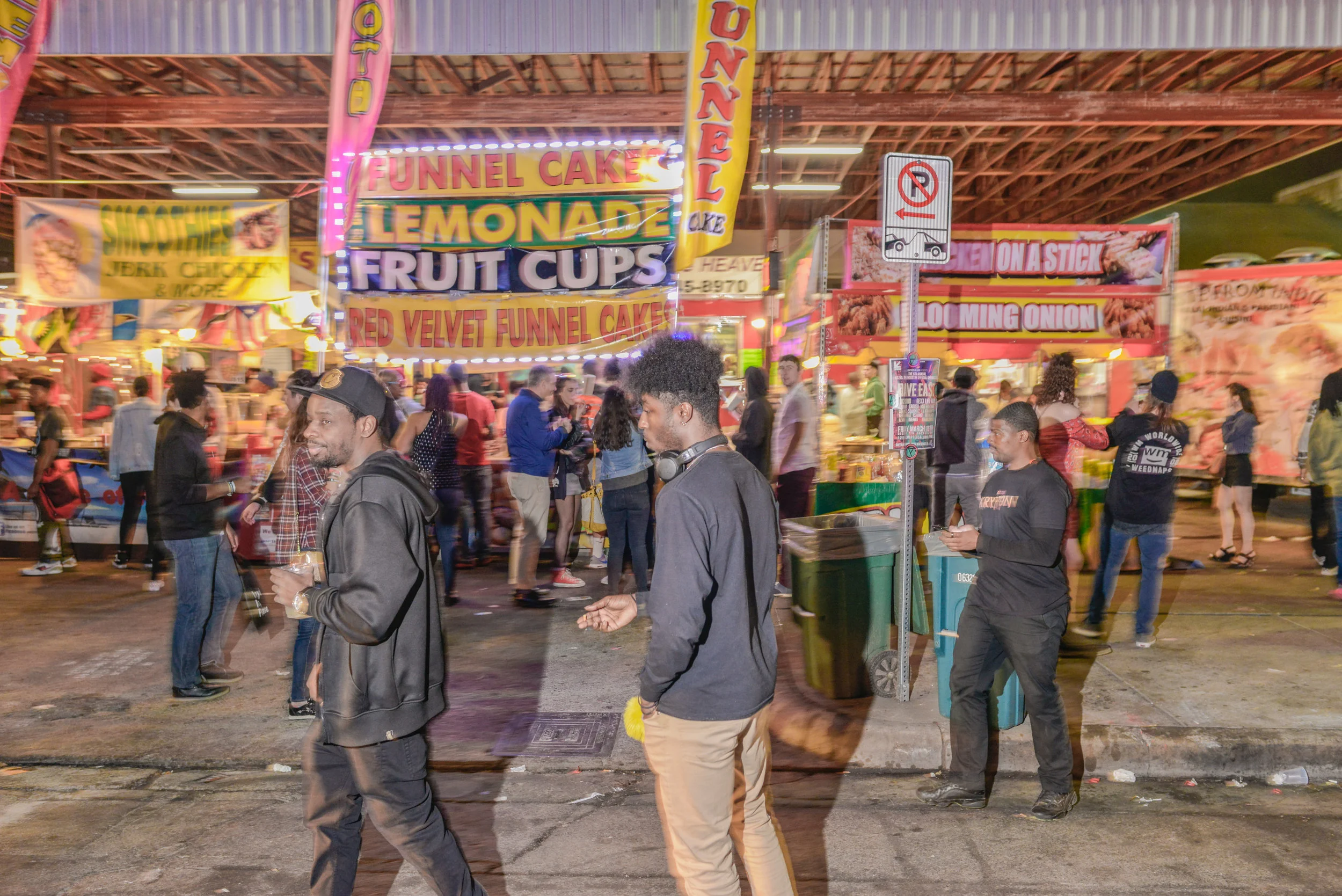 I know it's a bit out of focus but I love all the action in the background and I love the slight blur on these folks
