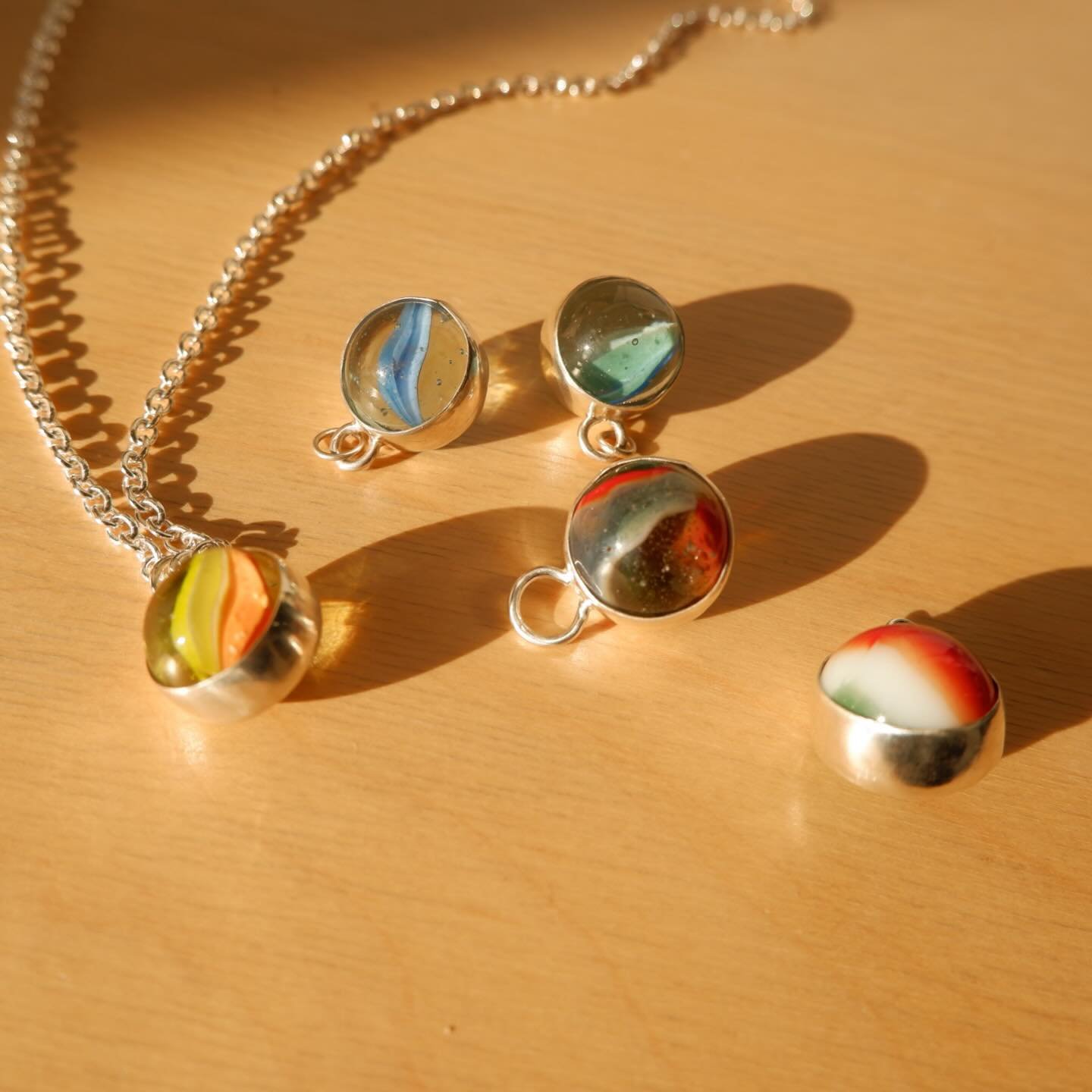 Spinning marbles will be part of a new jewelry drop this Monday at noon CST 🔮🔮