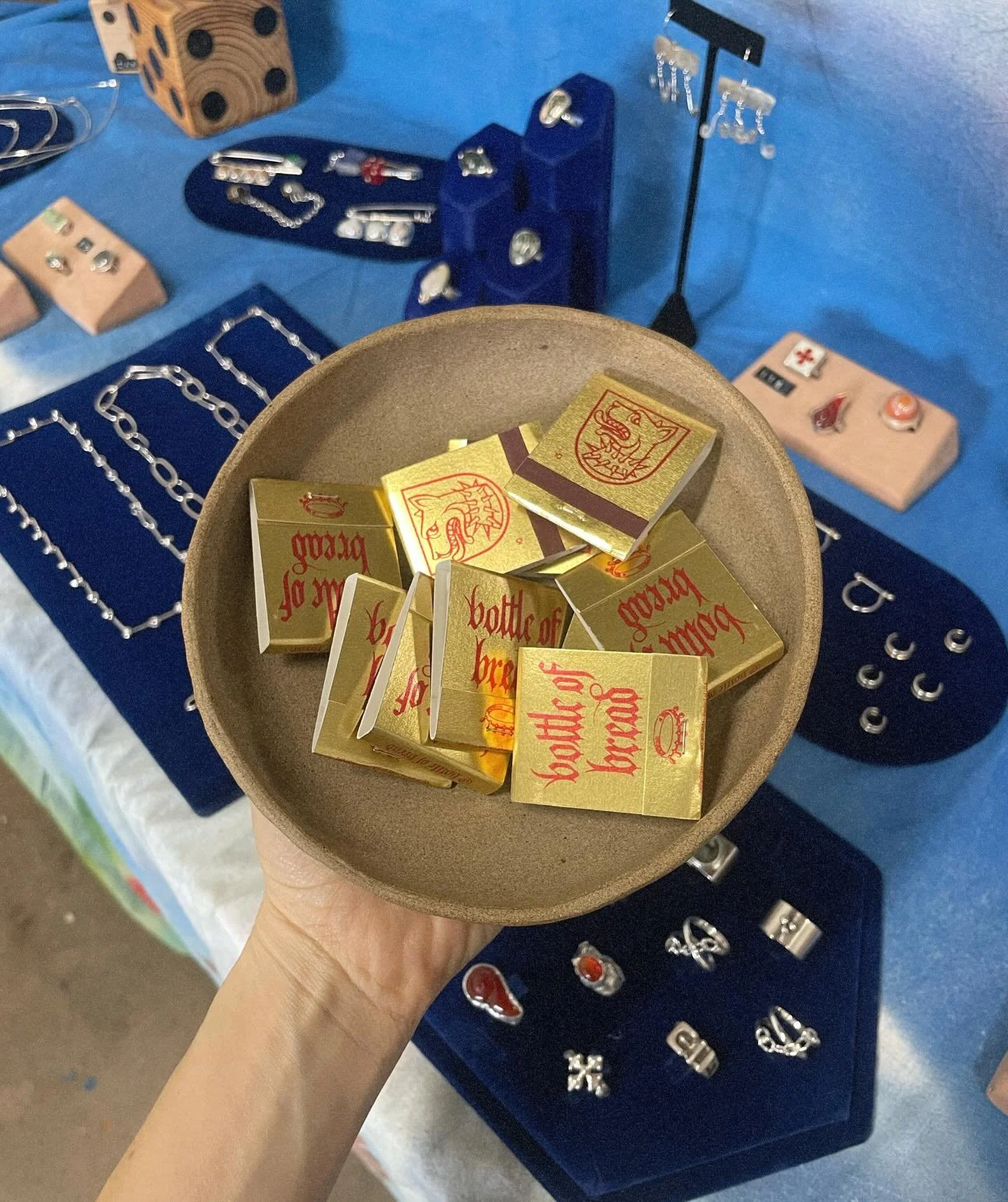 Redesigned the matchbooks in gold + red ❤️