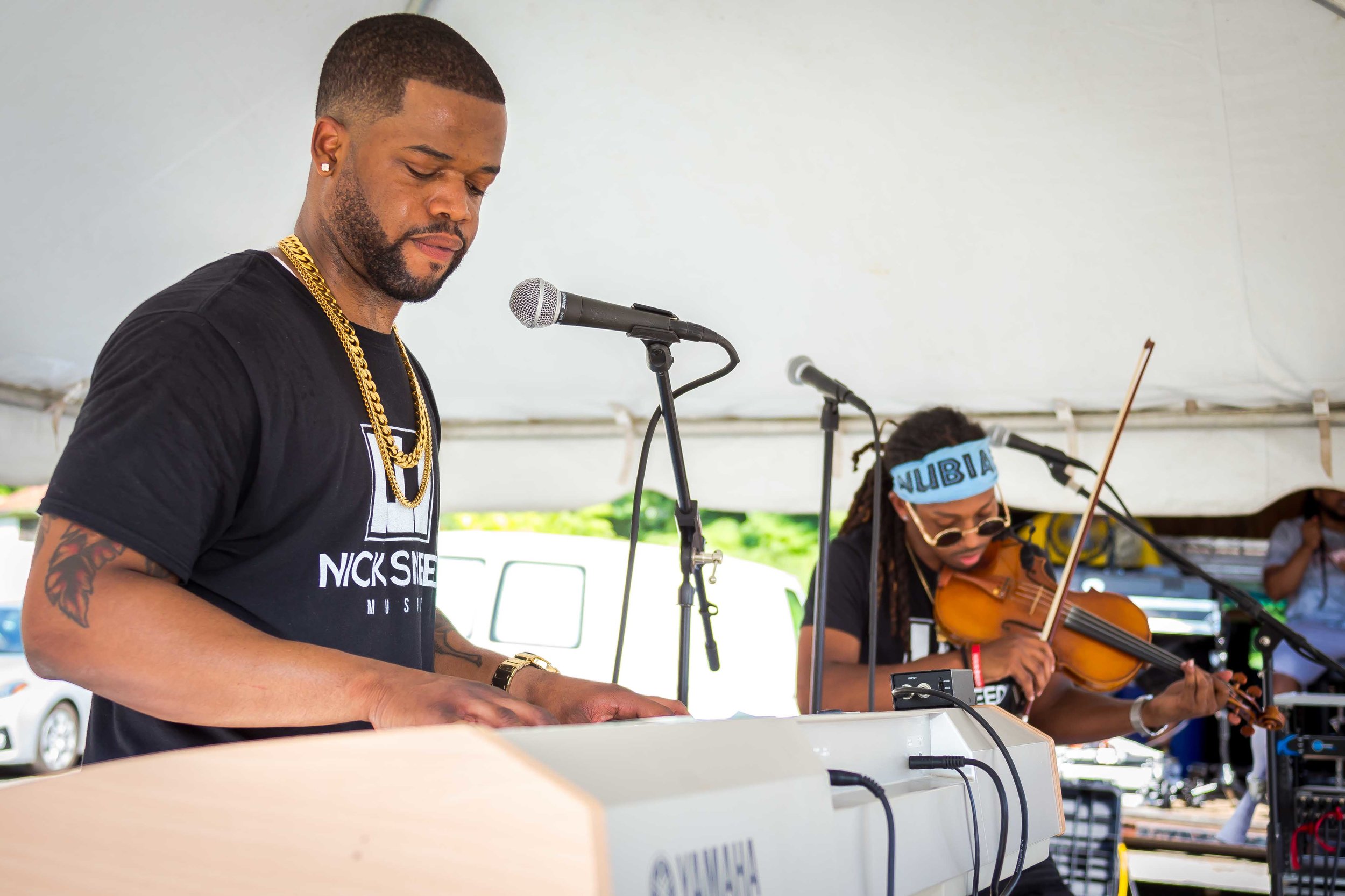 NSM on stage with Heru Playing Keys.jpg