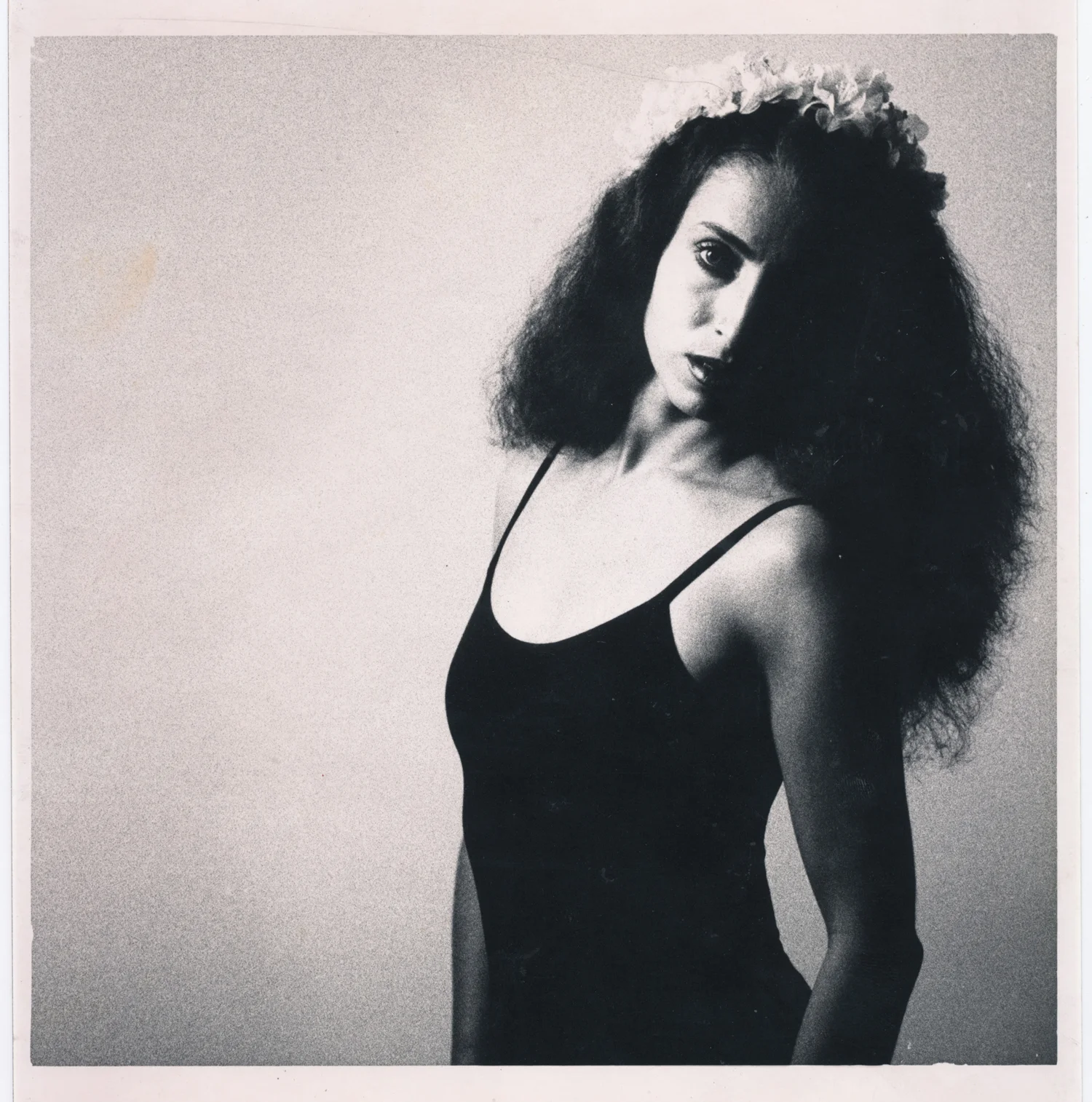 Jacque with Flowers in Her Hair35mm silver print.  © Jud Burgess  1987