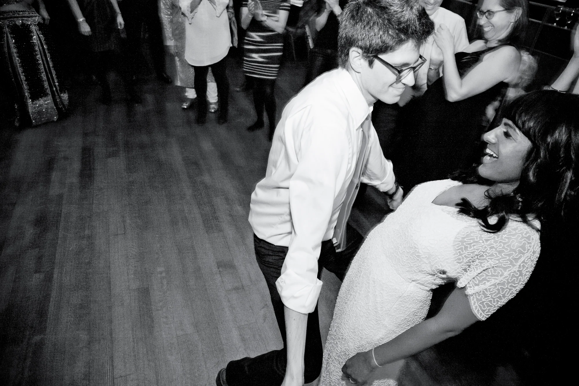 097_CarlyGaebe_SteadfastStudio_WeddingPhotography_NewYorkCity_Queens_FlushingTownHall_Smithsonian_Bride_Groom_Dancing_Reception.jpg