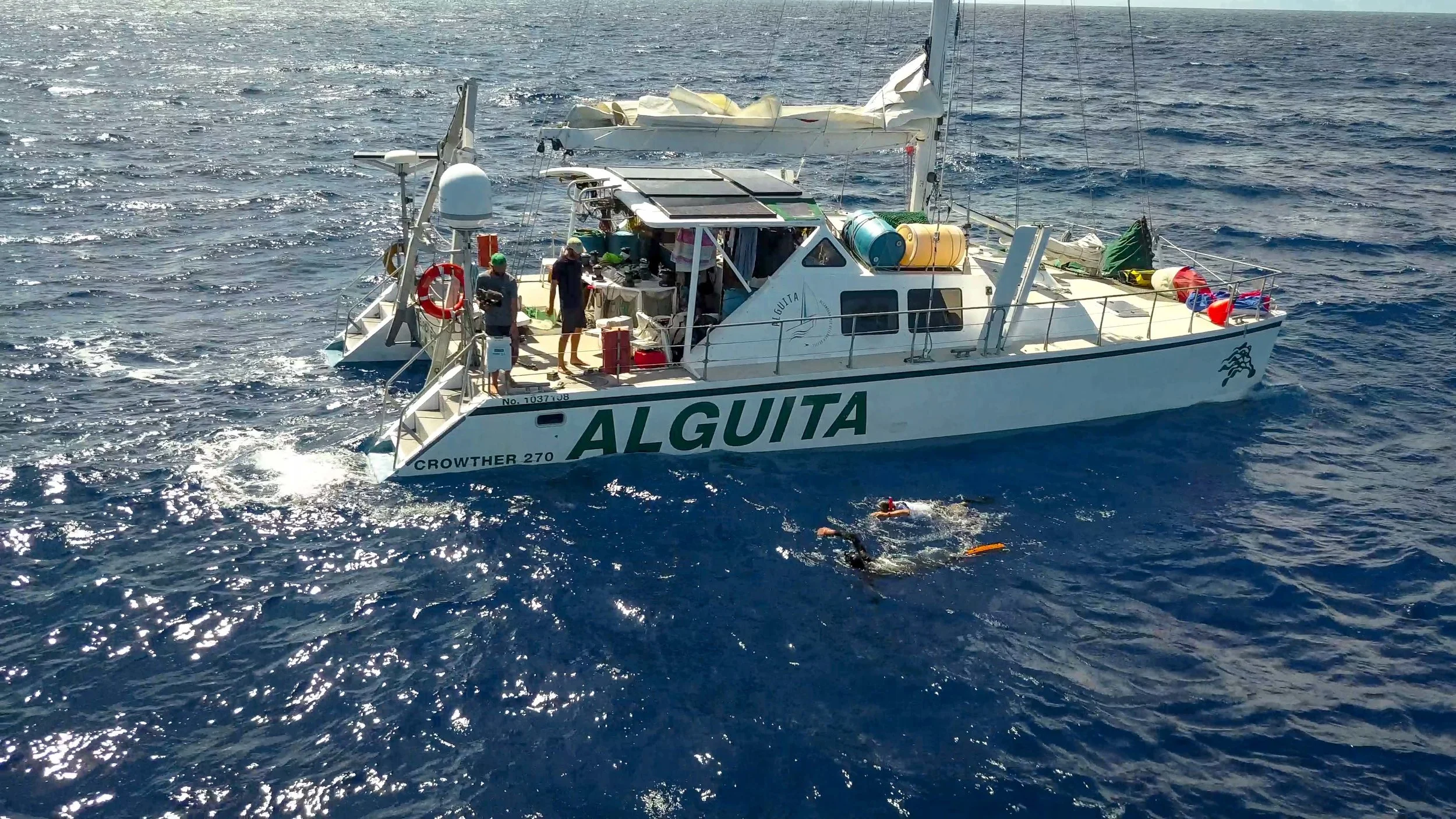 CAPTAIN MOORE AND BEN LECOMPTE OF THE VORTEX SWIM TEAM (IAMOCEAN) TAKE A “BUDDY” SWIM TOGETHER
