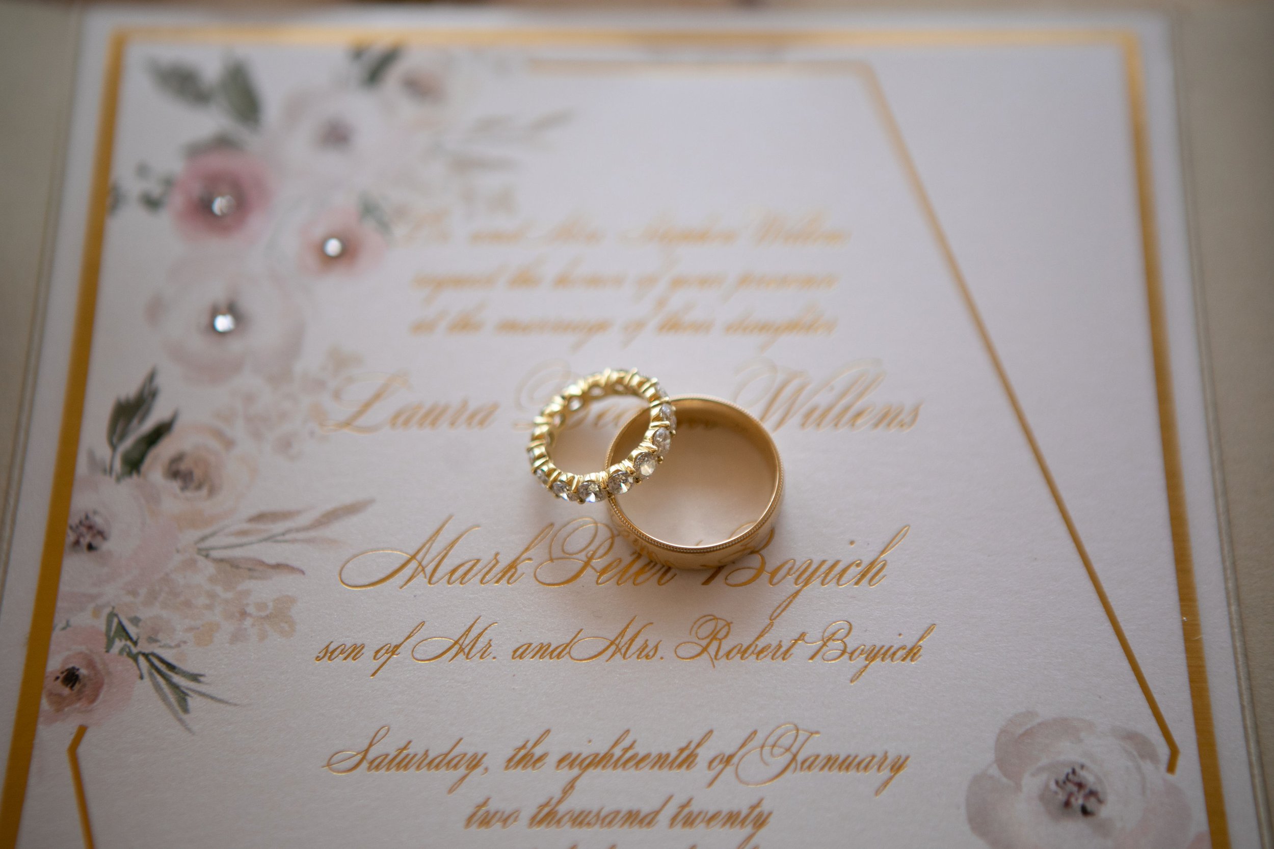 Foil stamped invitation with swarovski crystal embellishments. Photo credit: Boone Studios