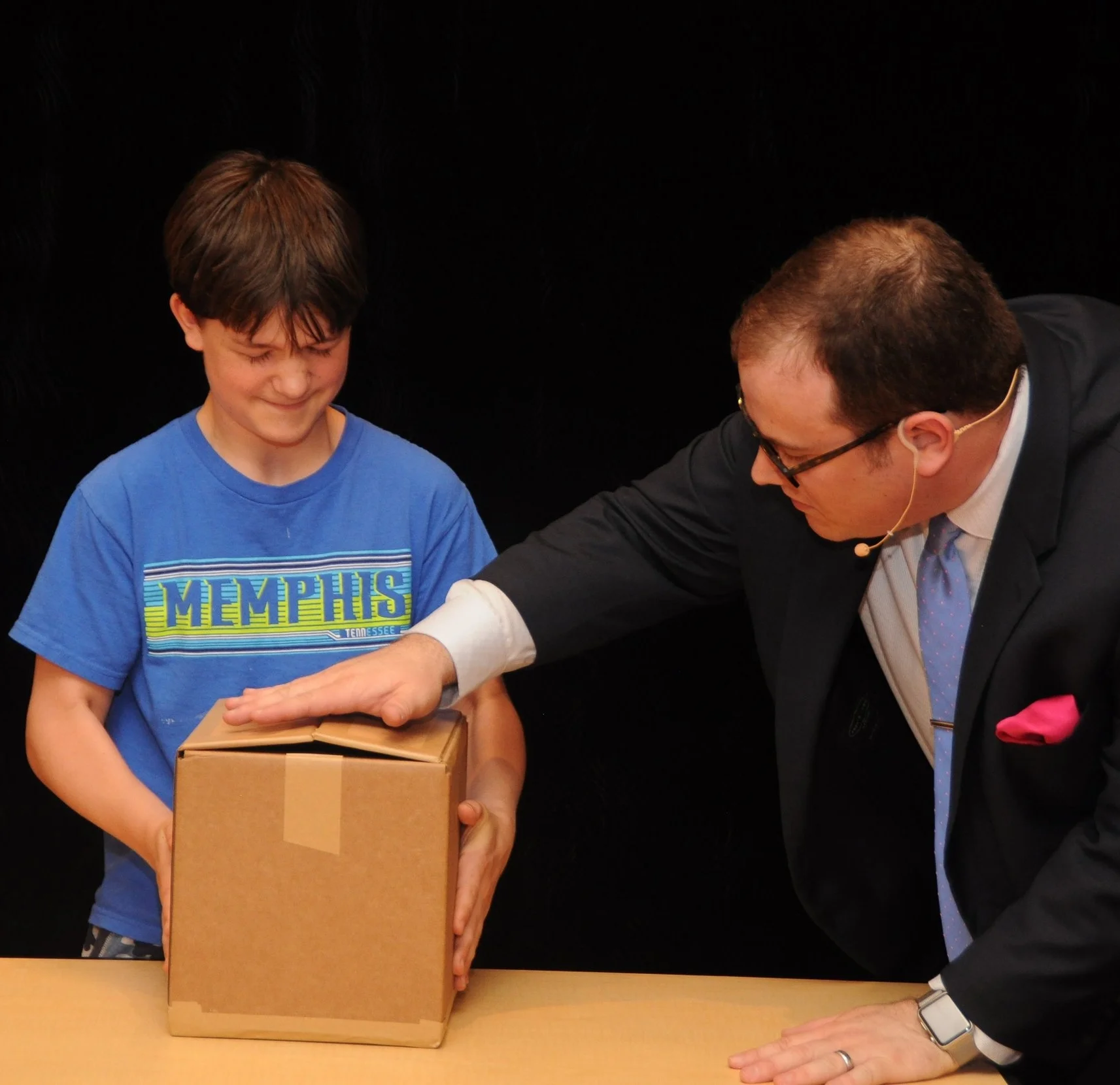 To teach empathy and demonstrate how bullying victims can feel, this seventh grader is suddenly unable to lift a small cardboard box.