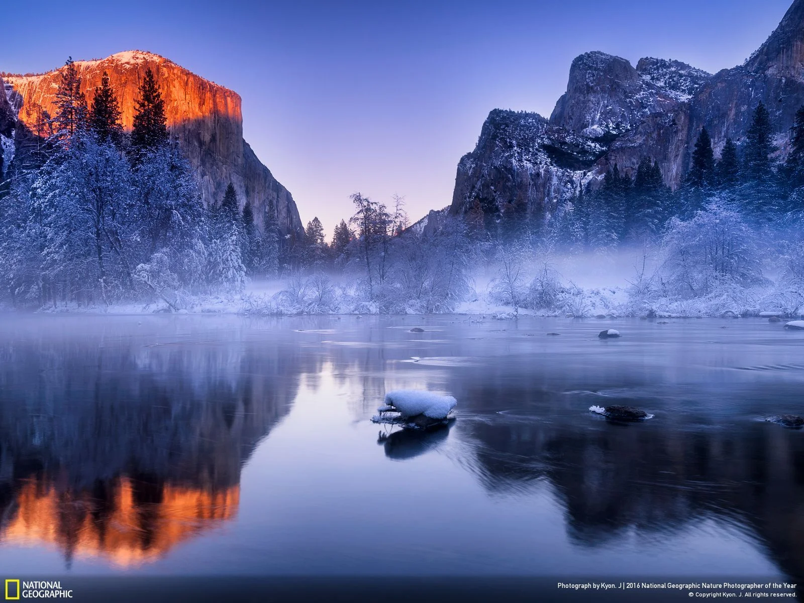 Light of Hope by Kyon J.: I spent my new-year-holiday in Yosemite Valley and cheered for the new year there!! I had been waiting and expecting for such a kind of sunlight coming down the mountain top and turning red gradually before sunset. Luckily I finally got this magical light, which to me, meant to the Light of Hope, celebrating the brand new 2016! Location: United States
