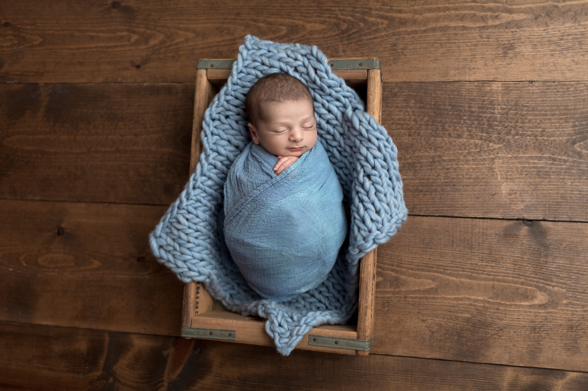 baby in a crate