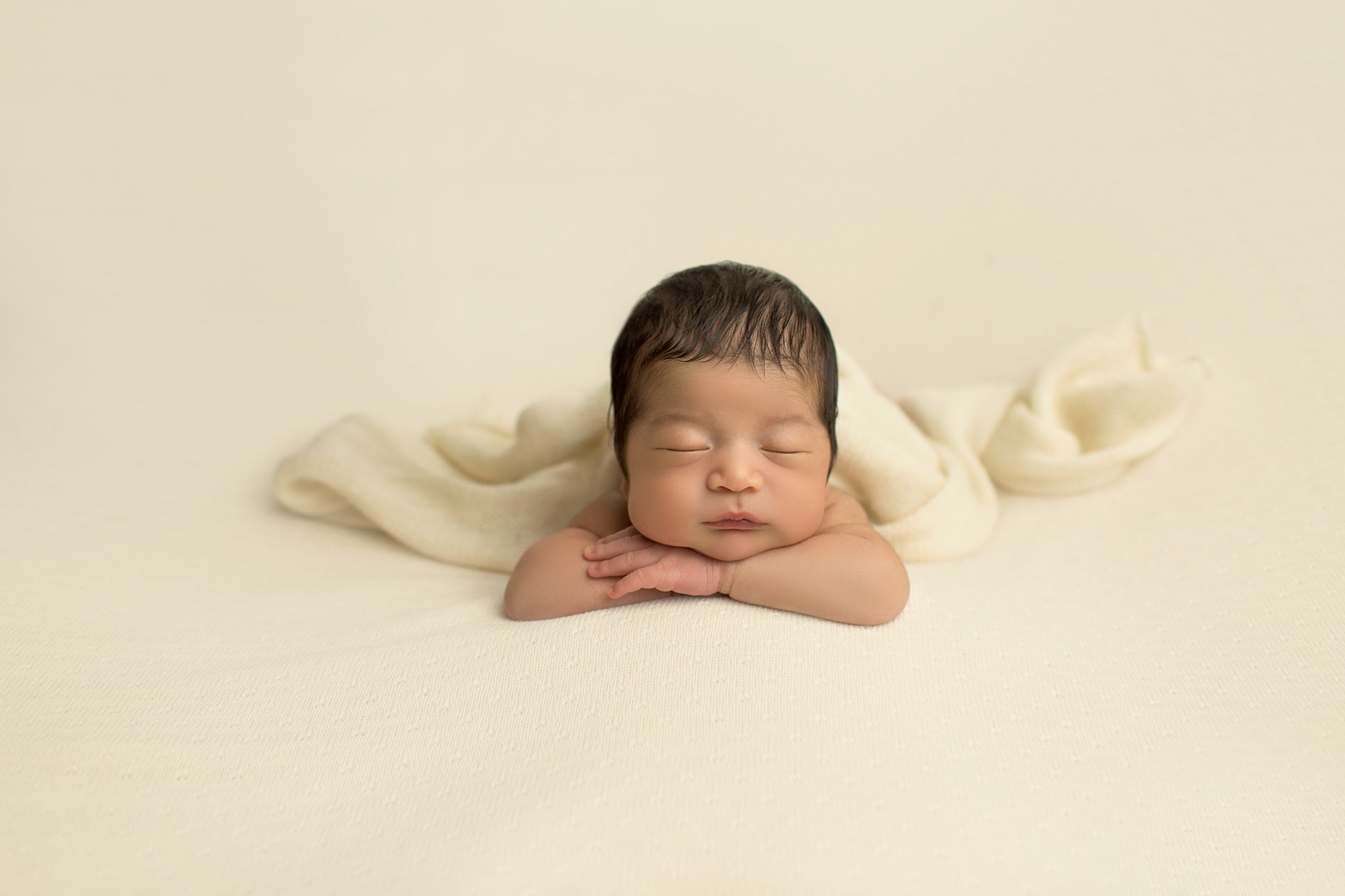 baby boy in cream