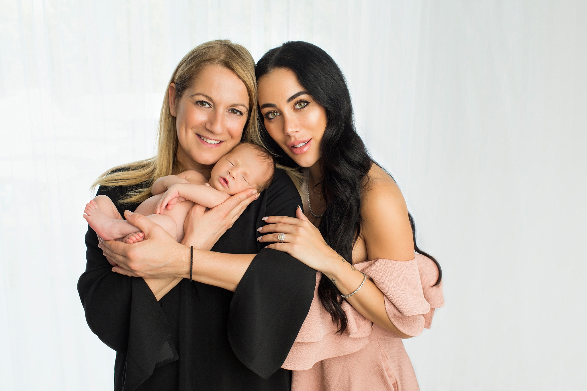 Rebecca Stella with her newborn and mom