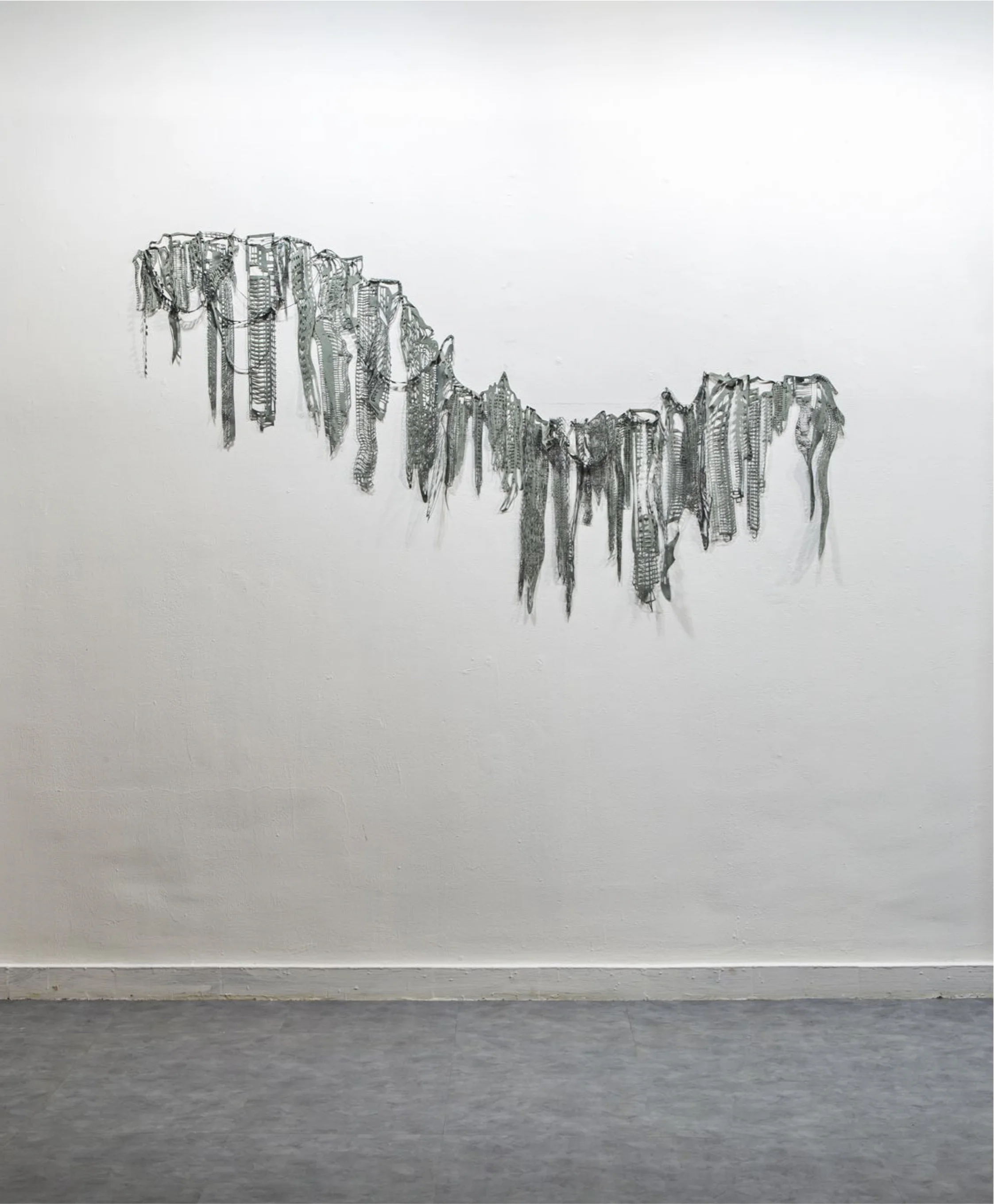 2017, collage, pastel, laser cut paper, Museo de Arte Contemporaneo, Panama. Series of 6 installations located throughout the building’s stairway, wall corners, ceilings and other spaces. Laser cut and collaged fabric and paper shape sculptures of imaginary lichen species “endemic” to Panama. Each of the “species” is based on a hybrid between architectural and organic forms, for example, 16th c drawings of Spanish walls and forts, blueprints of American Canal Zone suburbs or current Google Images of the newest Panama City skyline are abstracted in dialogue with the many forms and textures of lichens found around Panama’s city and forests.