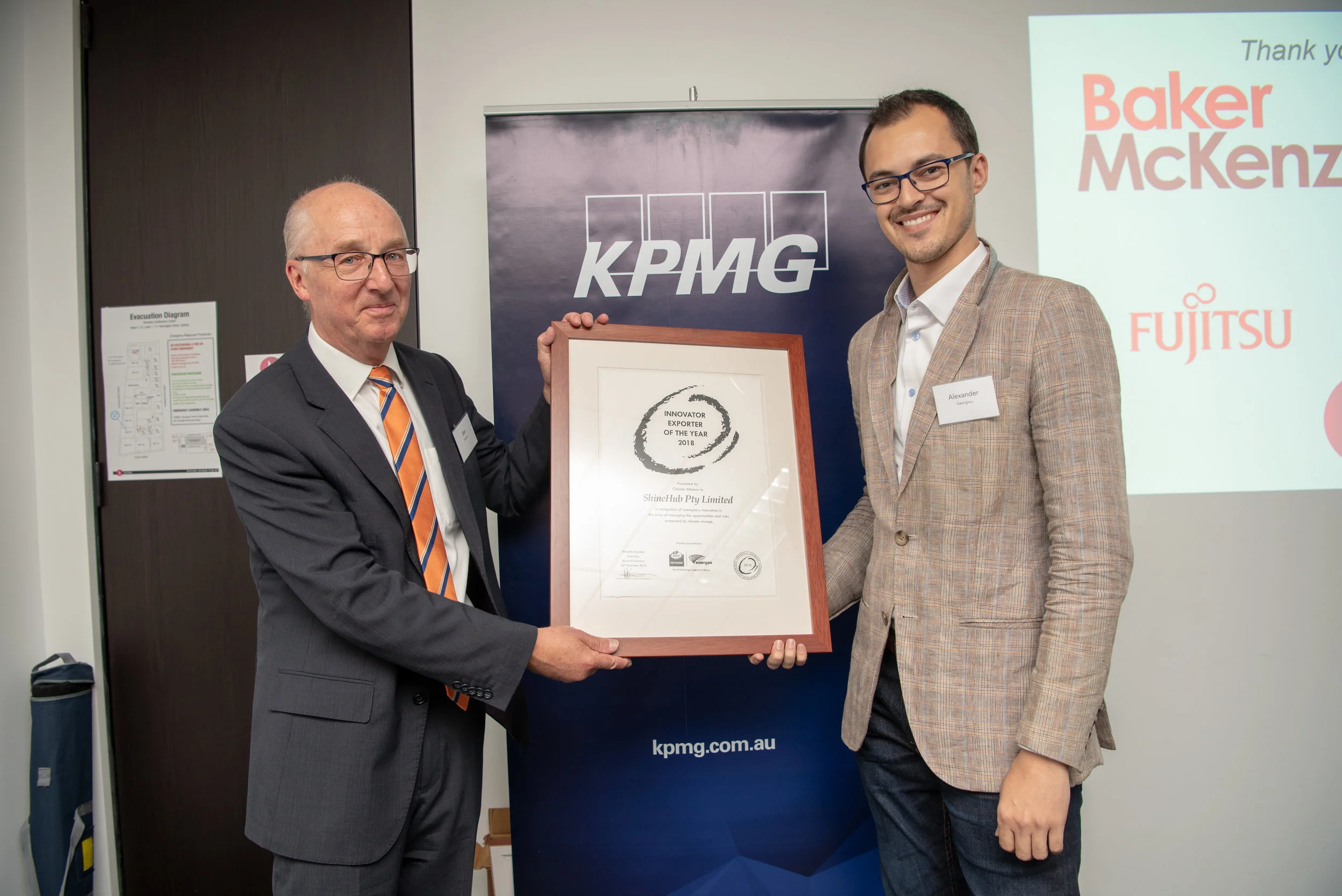  Innovator/Exporter of the Year 2018 - ShineHub, represented by Founder and Director Alex Georgiou, with Ben Scheltus, CEO of Climate Alliance. 