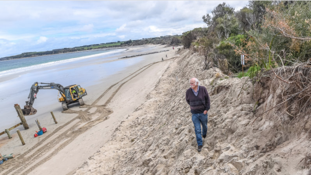 This Victorian surf club is under threat as climate change eats away at the coast | The Age