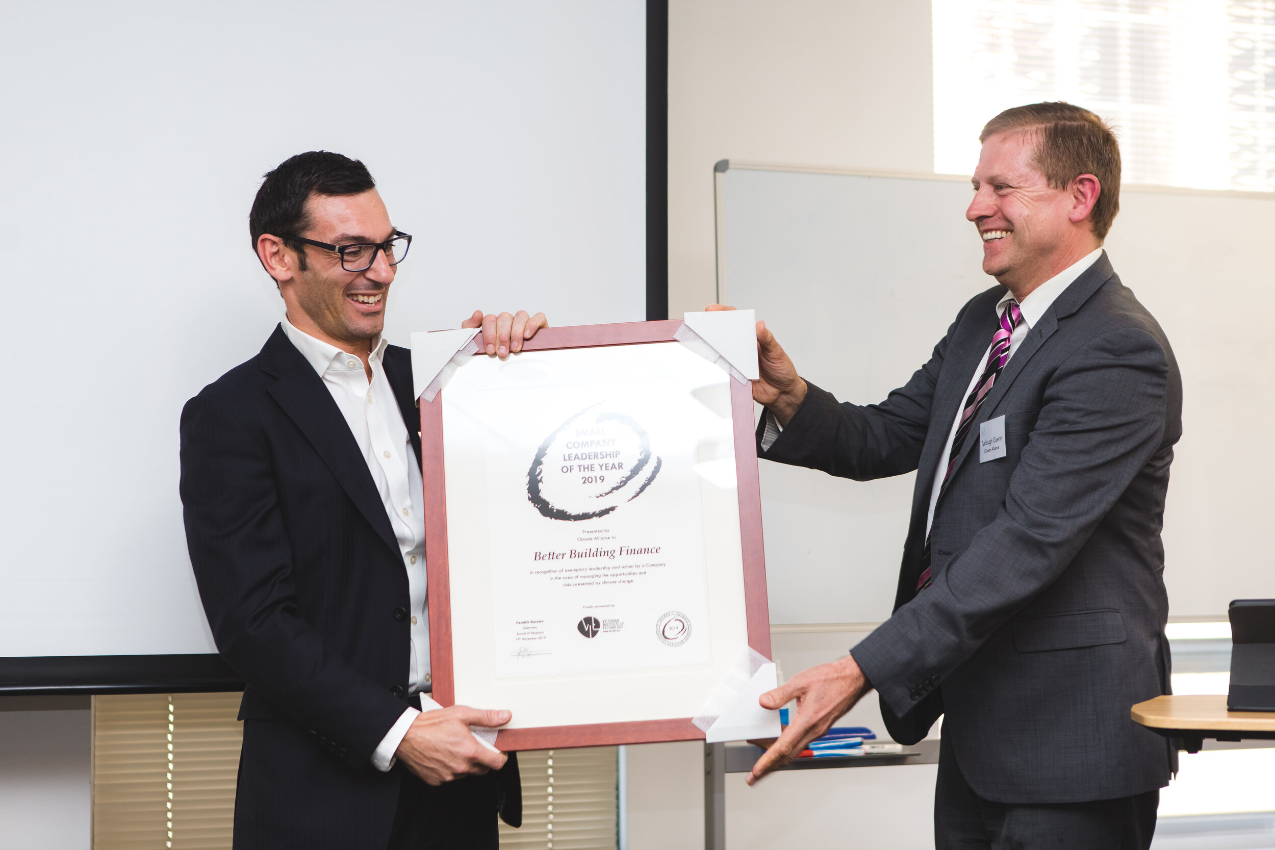  Small Company Leadership of the Year Award winner Better Building Finance, represented by Ed Cotter, with Turlough Guerin, Chairman Climate Alliance Board of advisors. The award was sponsored by VIT. 