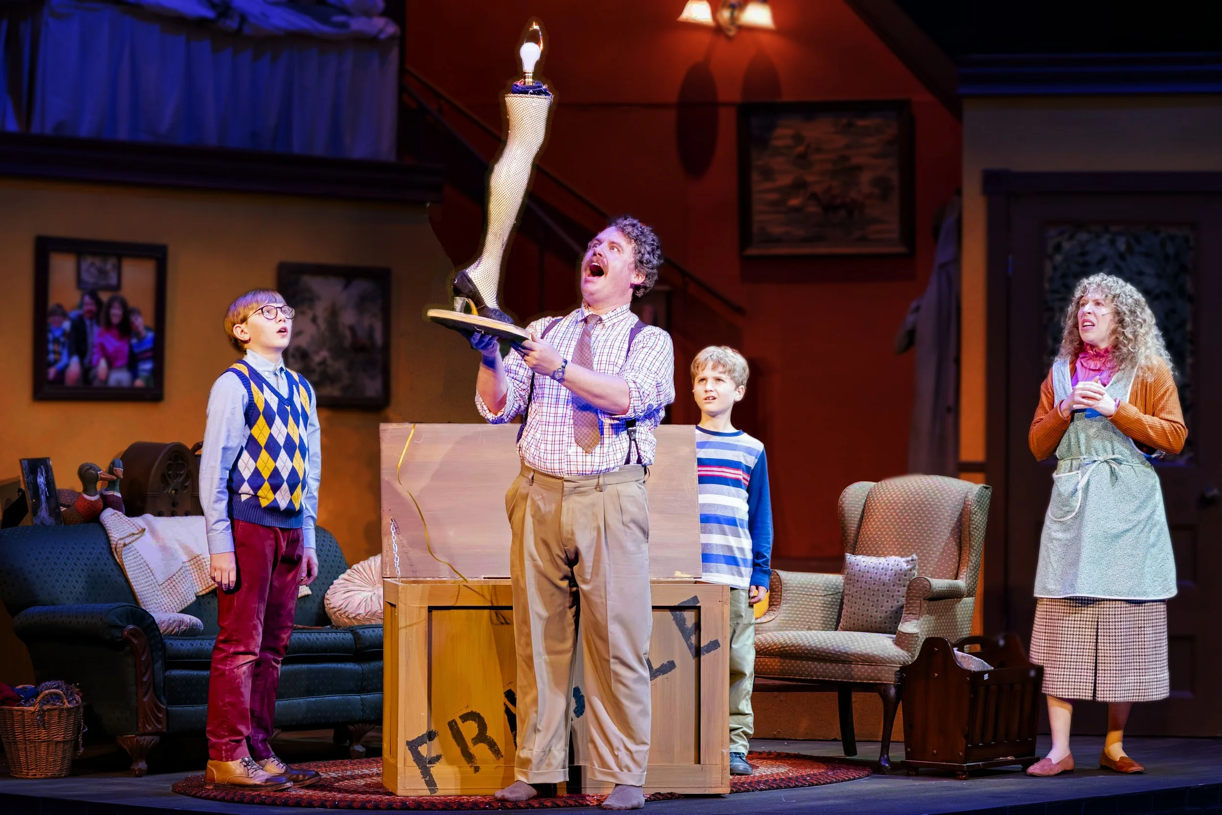 Scott Watson as The Old Man celebrates winning a “major award” in A Christmas Story at Mill Mountain Theatre, Roanoke VA (2025). Photo by Richard Clompus.