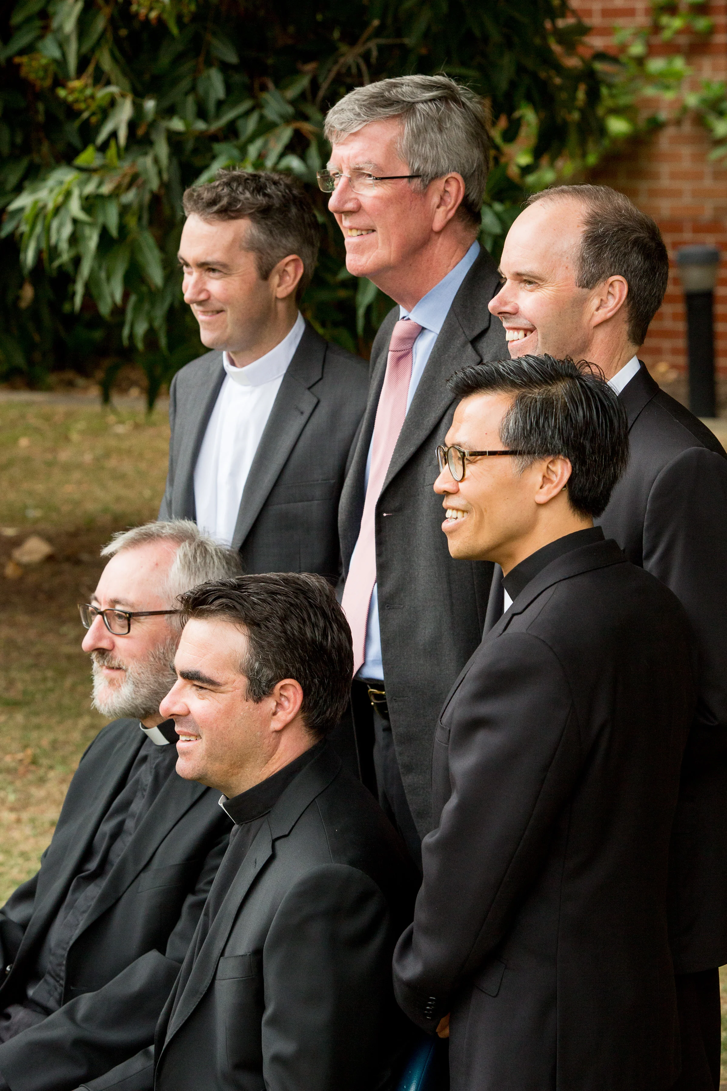 Fr Jake Mudge, far back left, with the staff at Corpus Christi College. 