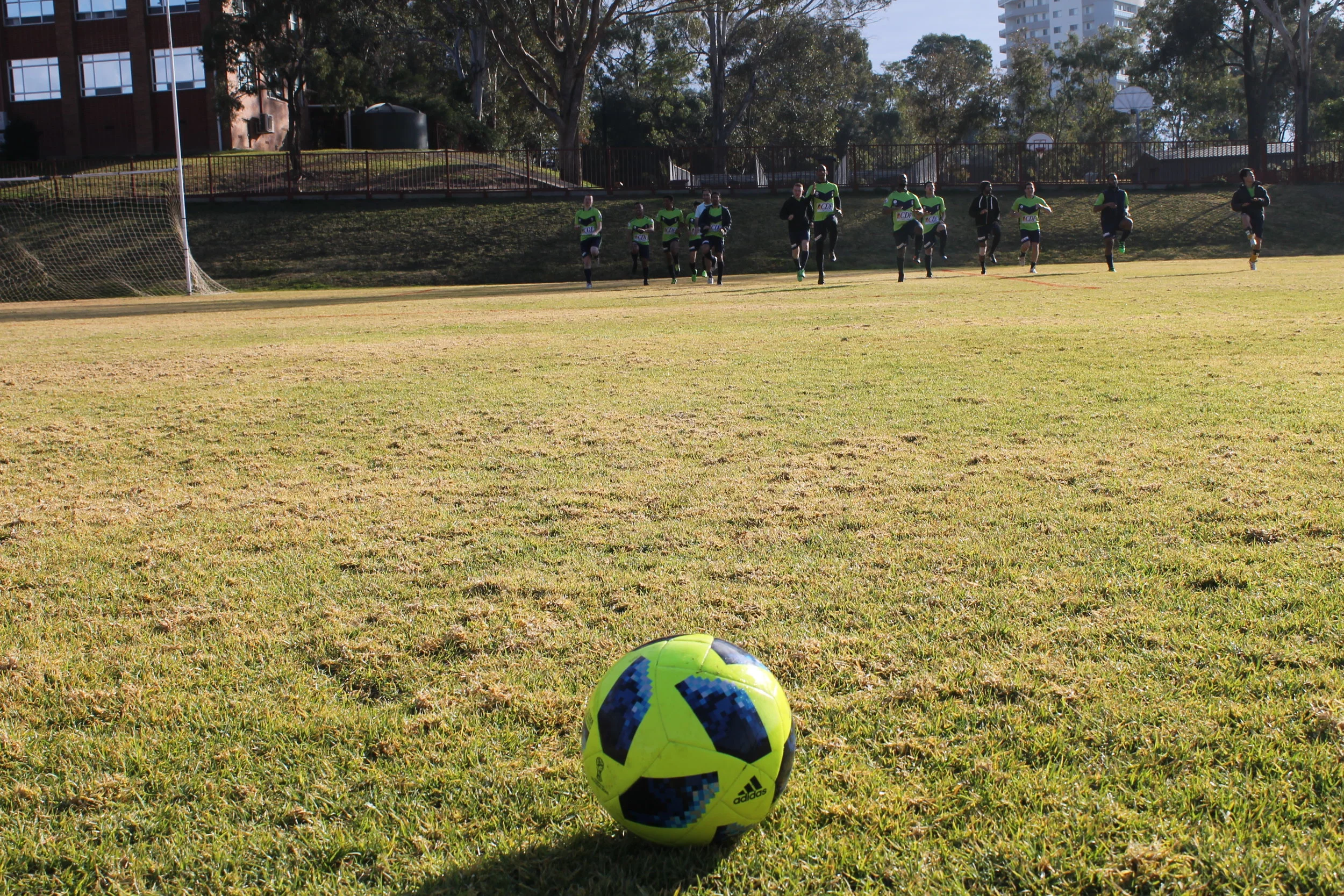 Corpus Christi College seminarians warming up for their games at the tournament.