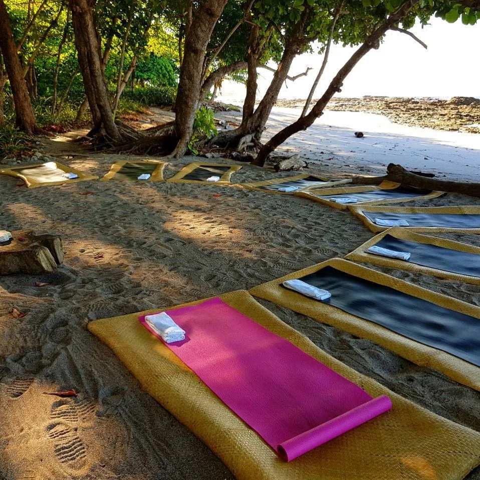 Jennifer helped implement complementary yoga at Latitude 10, now offered in the morning a few times each week on the shaded beach in front of the hotel.
