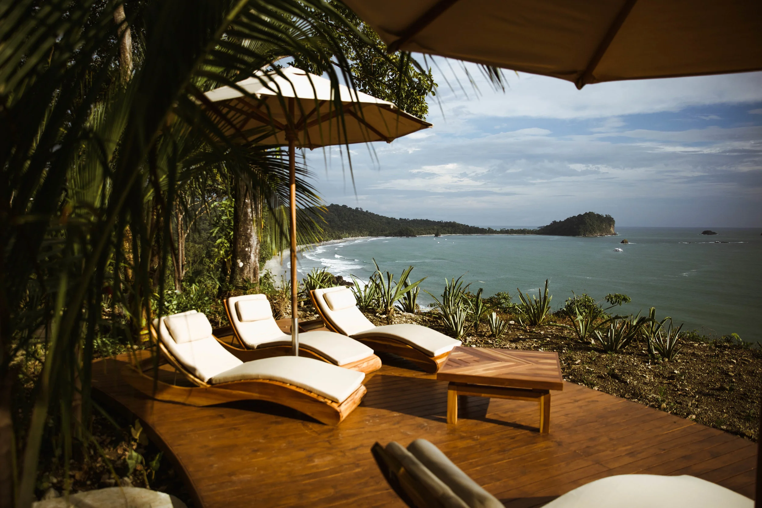 Swanky teak loungers...