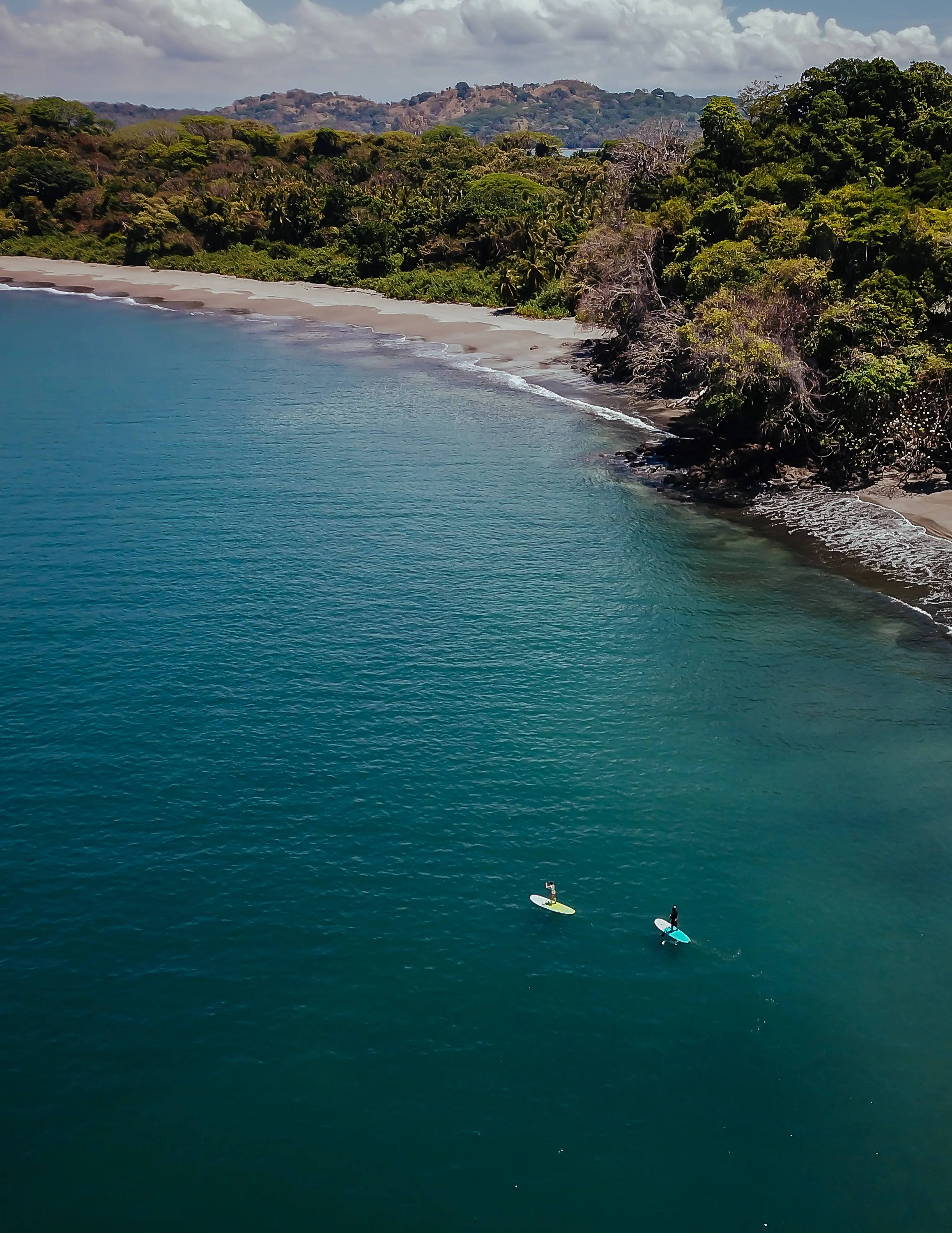 Paddle boarding off the coast of Isla Palenque