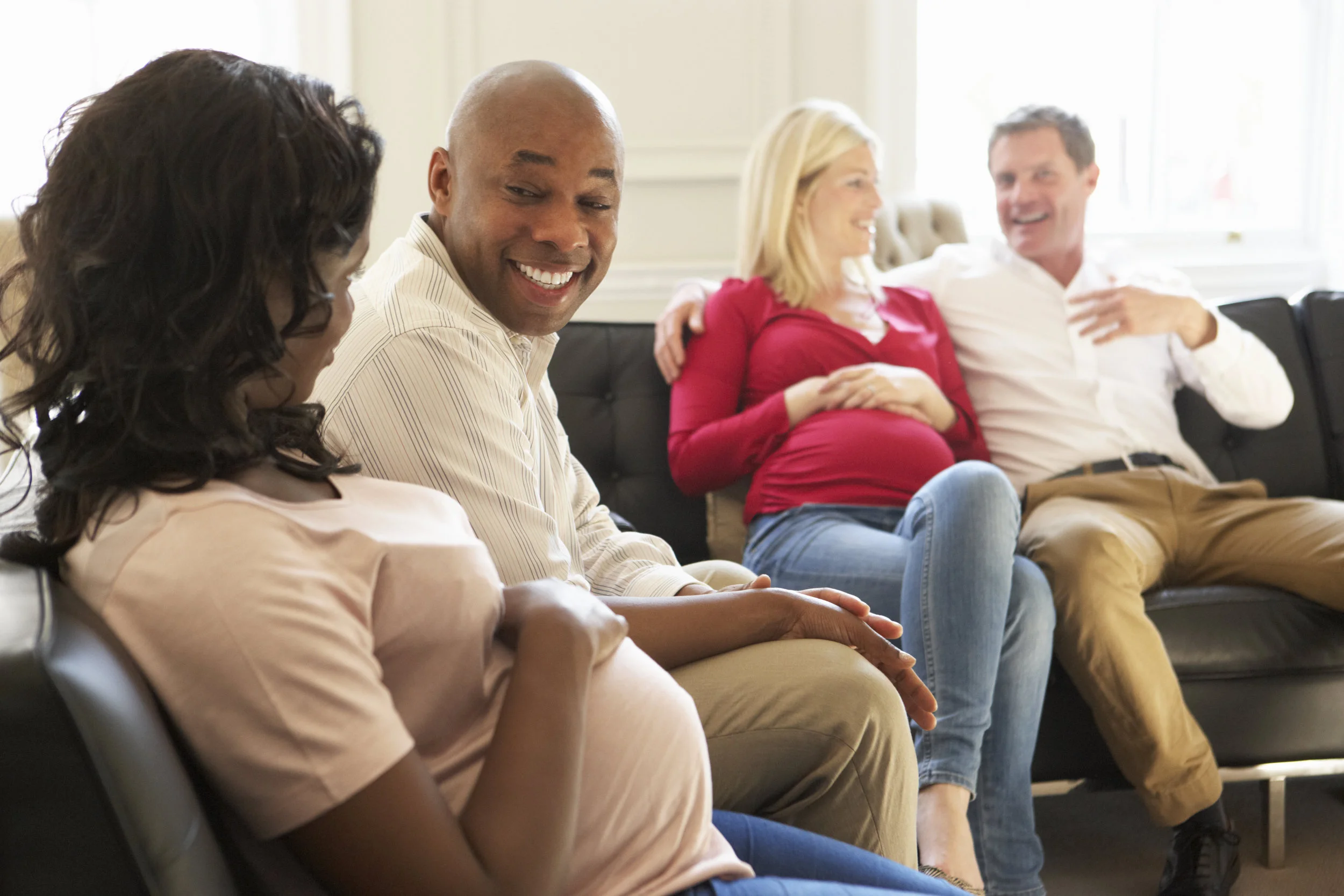 Canva - Couples in Waiting Room of Ante Natal Clinic.jpg
