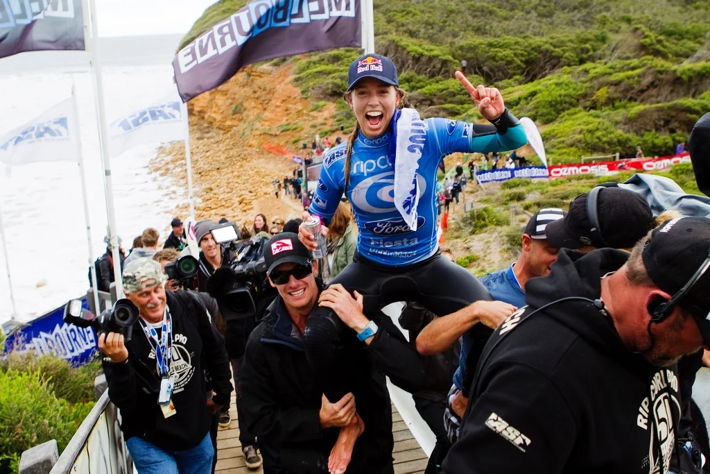 Dan Ross chairing Sally Fitzgibbons after her Rip Curl Pro win in 2012 at Bells.