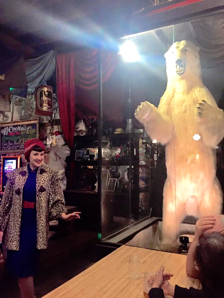Allyson posing with a HUGE polar bear!