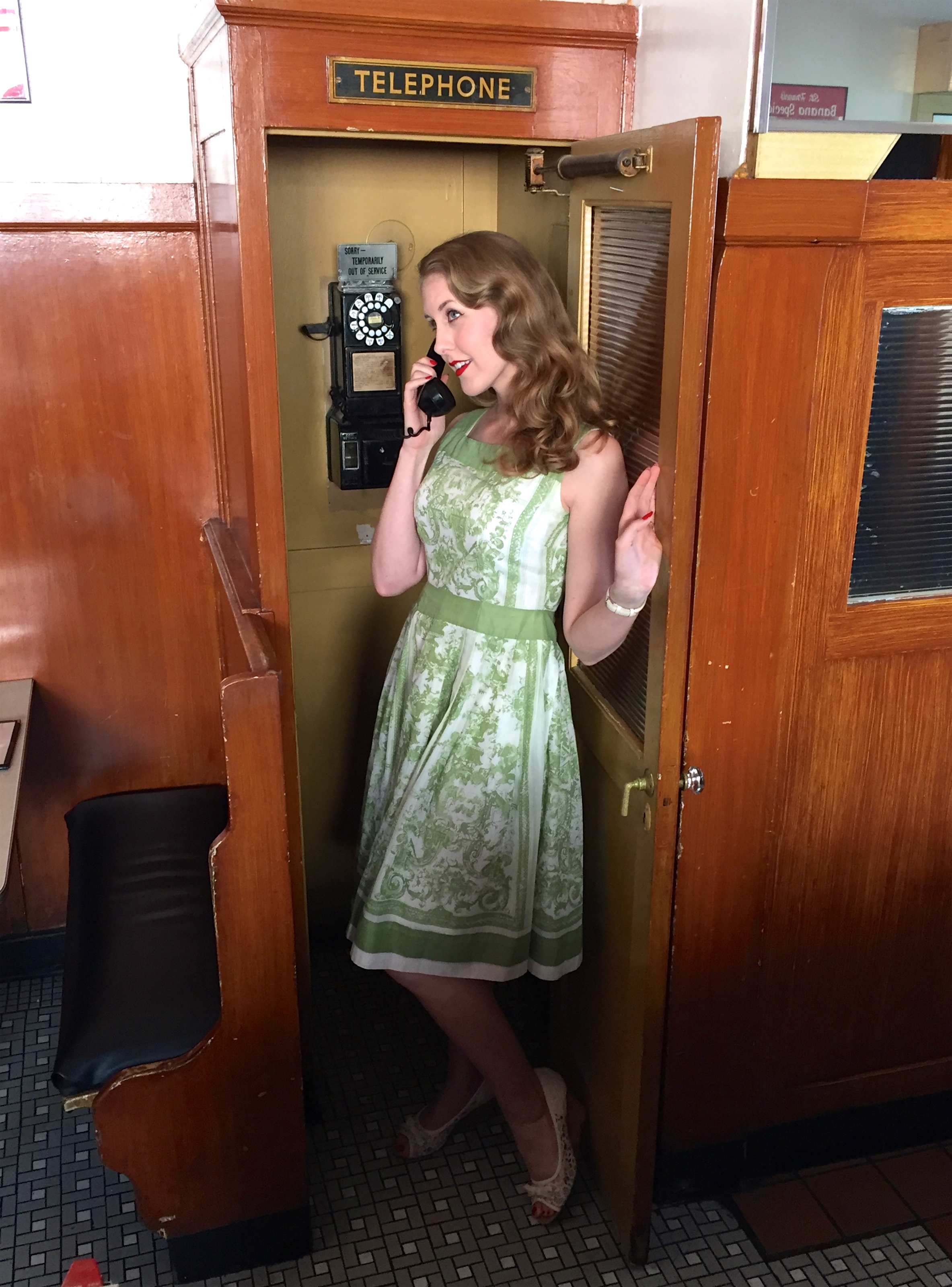Katrina having fun with the phone booth