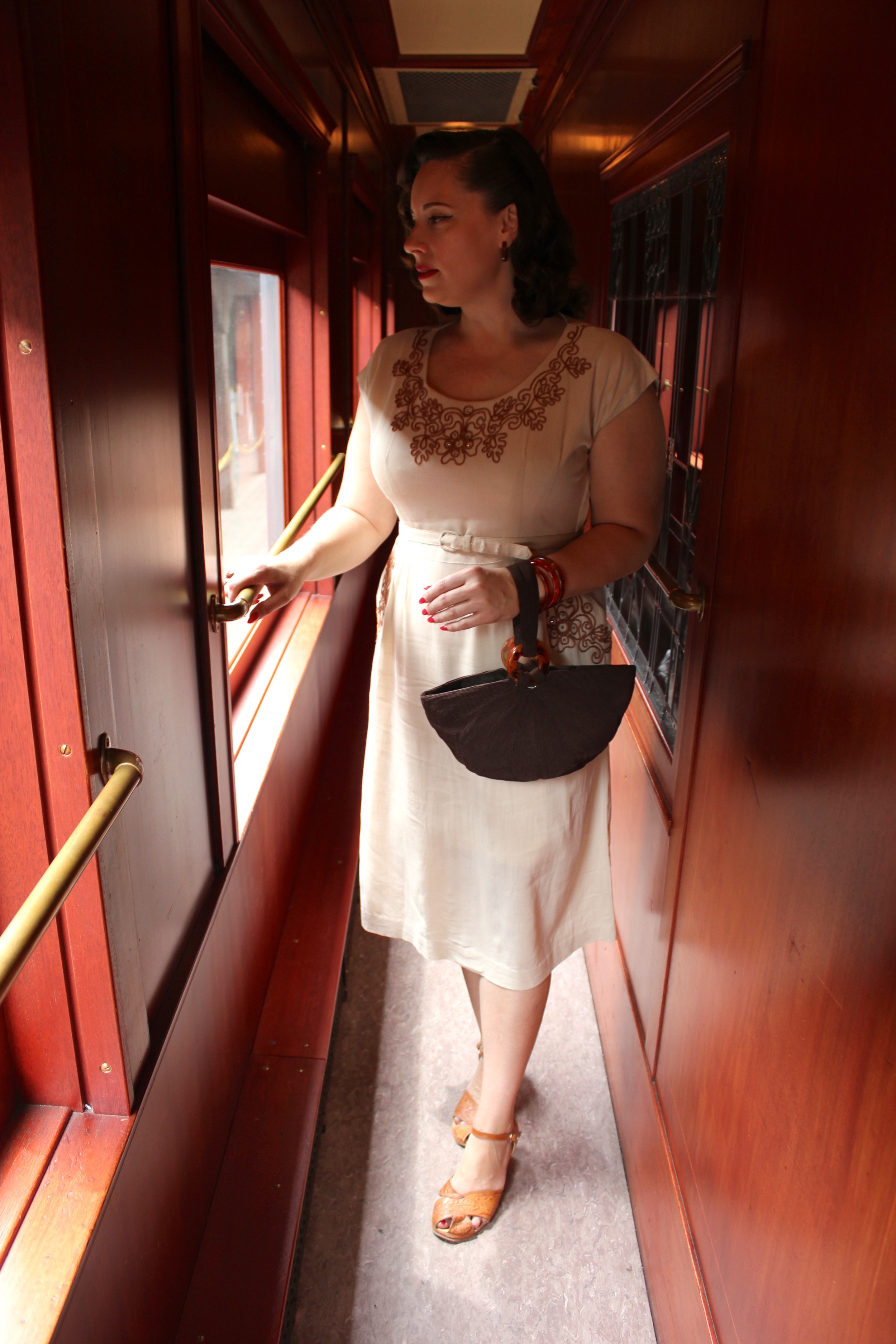 Andrea F. wanders the halls of the car