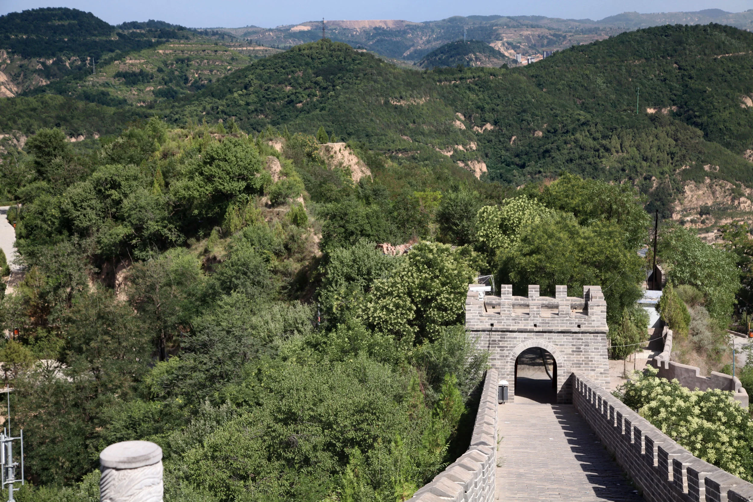 A restored section of the Yan'an wall, on the hill overlooking the Yan valley. Unrestored sections can be seen running towards the top left-hand corner.