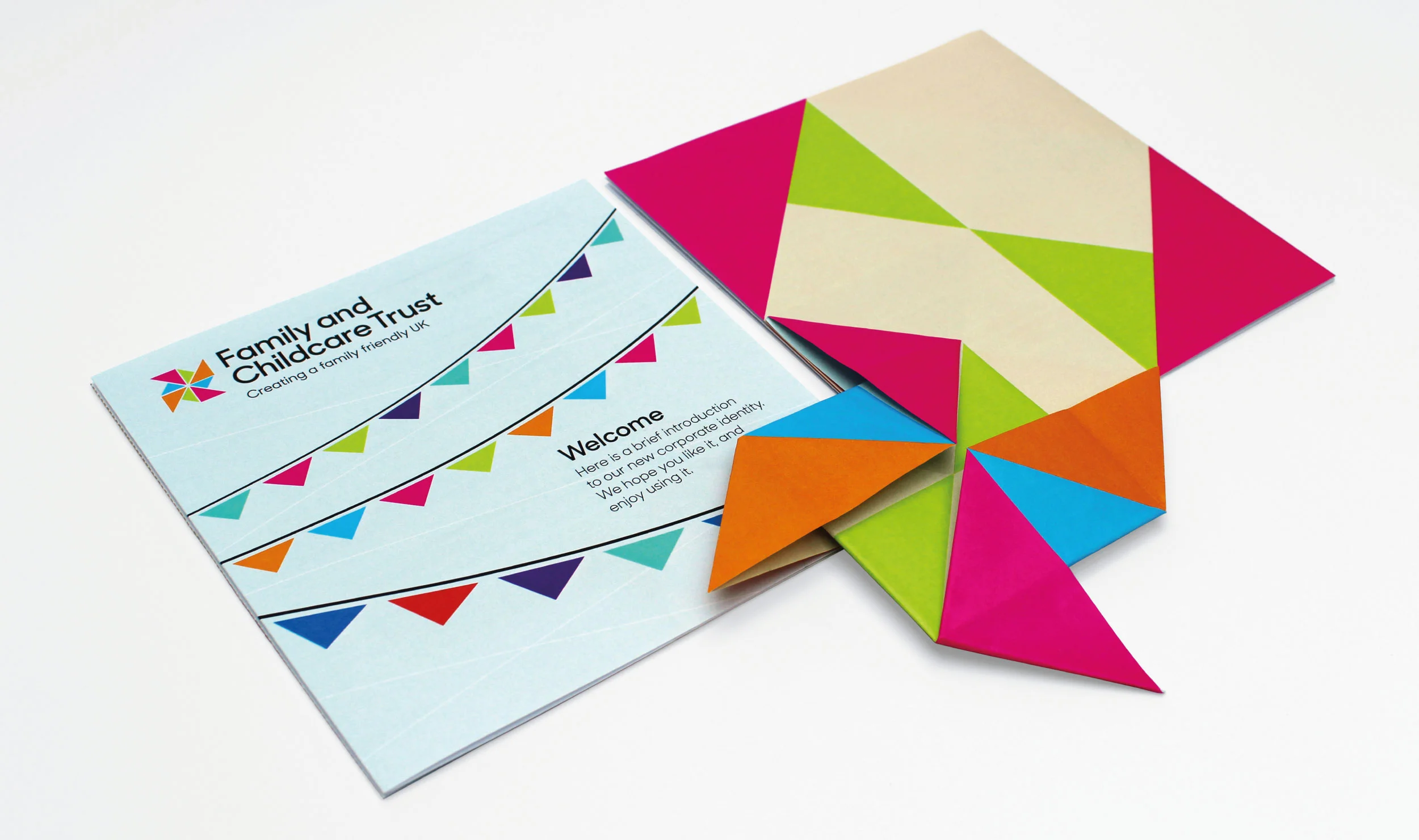 We liked the idea of using a graphic pinwheel as a positive symbol of childhood. The shapes within it were used to form a geometric visual language that combined gravitas with childlike charm.